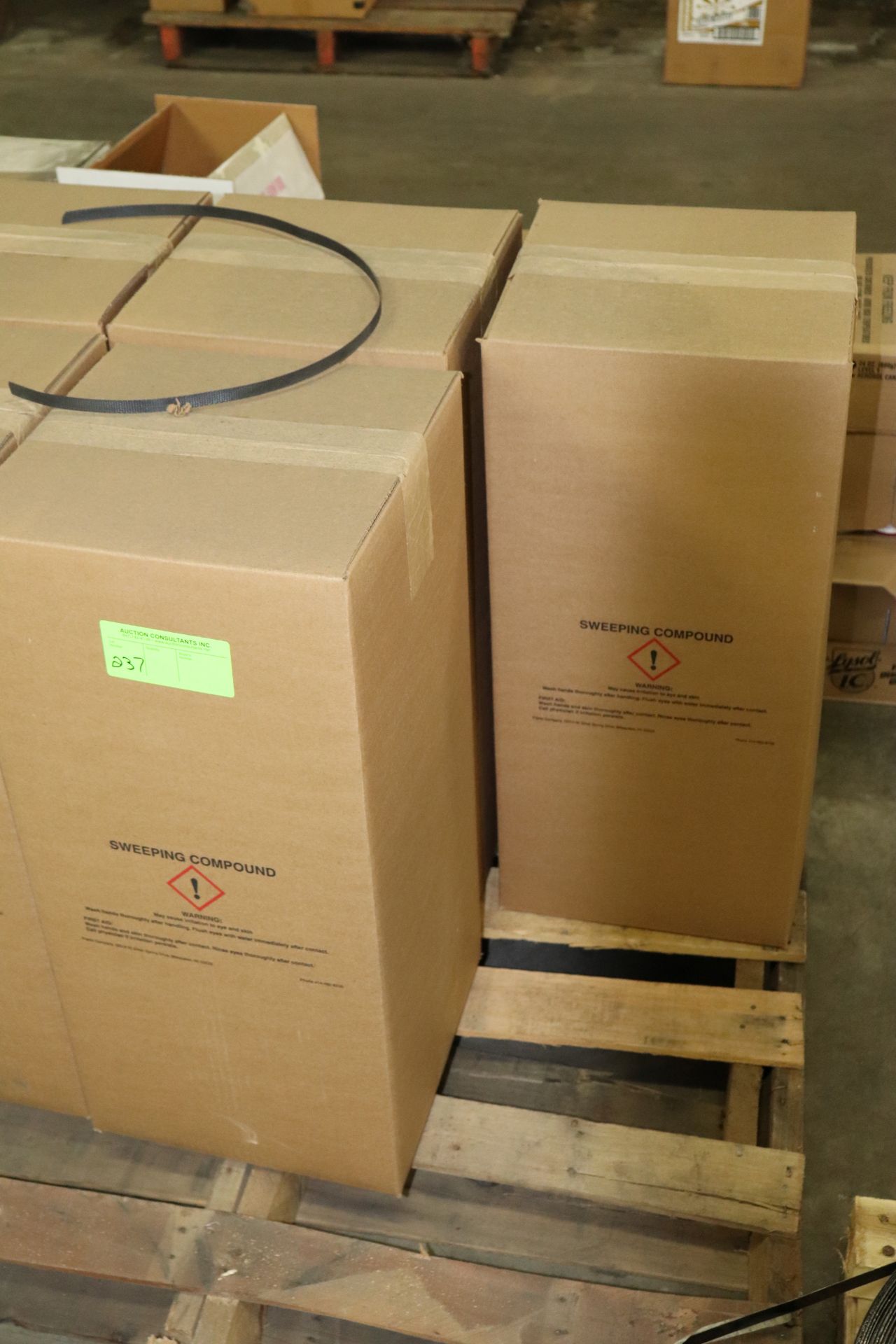 Three boxes of sweeping compound