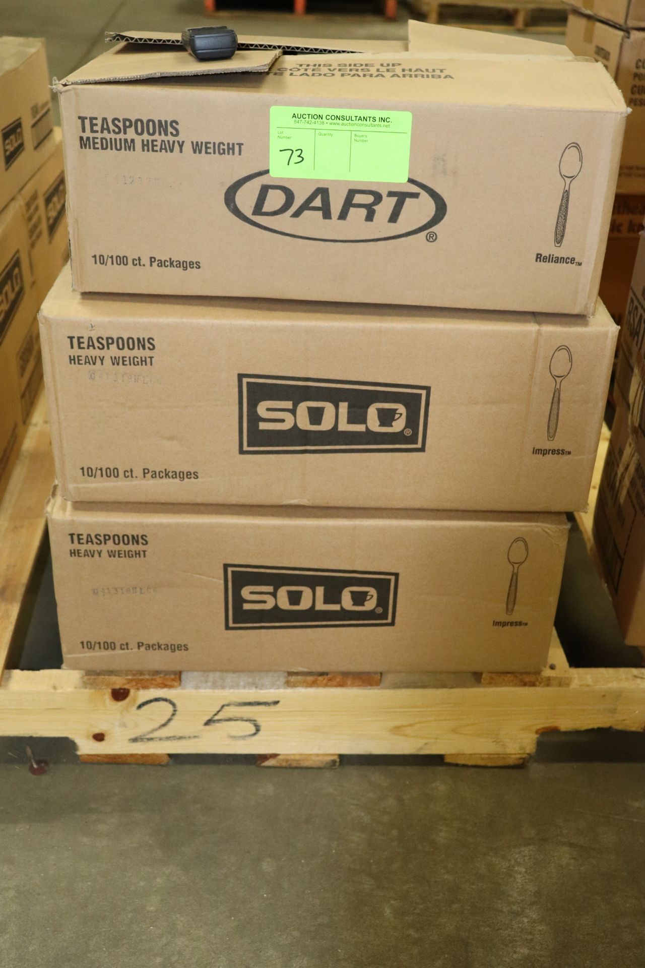 Two full boxes and one partial box of plastic spoons, Solo and Dart brand,