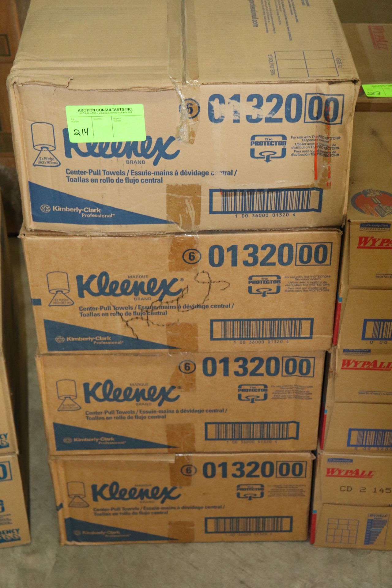 Four boxes of Kleenex brand center pull towels, four rolls per box