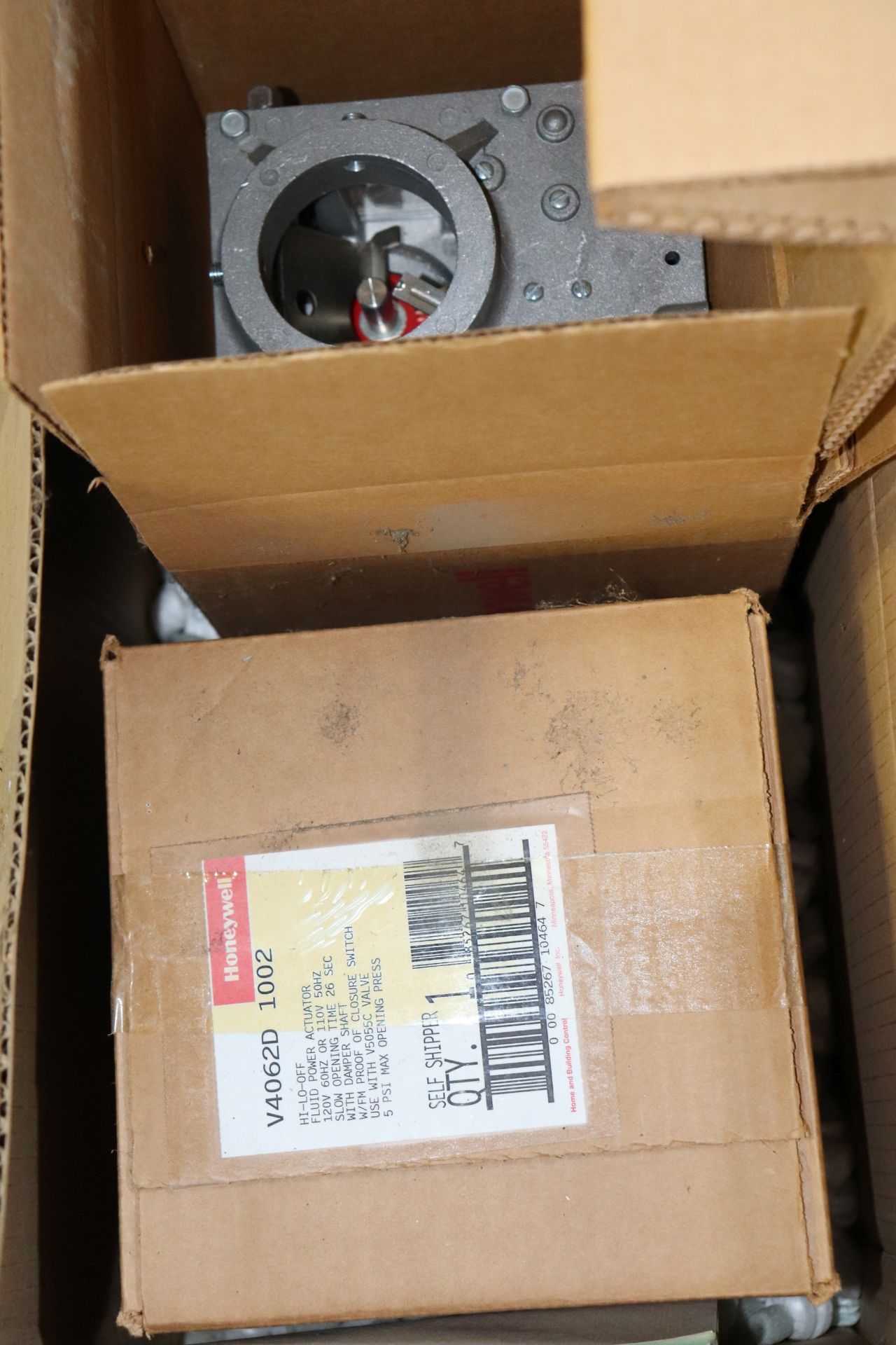 Two Honeywell hi low off fluid power actuators, 120 volt, new in box