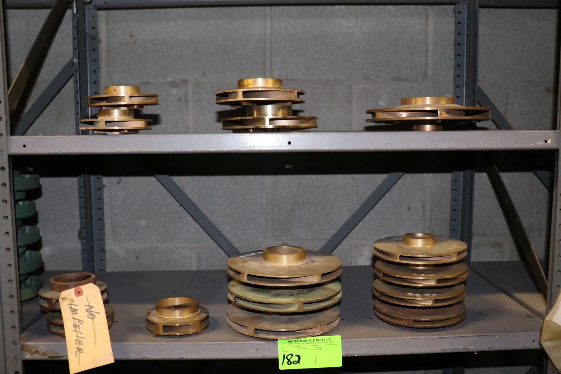 2 shelves of various sized impellers