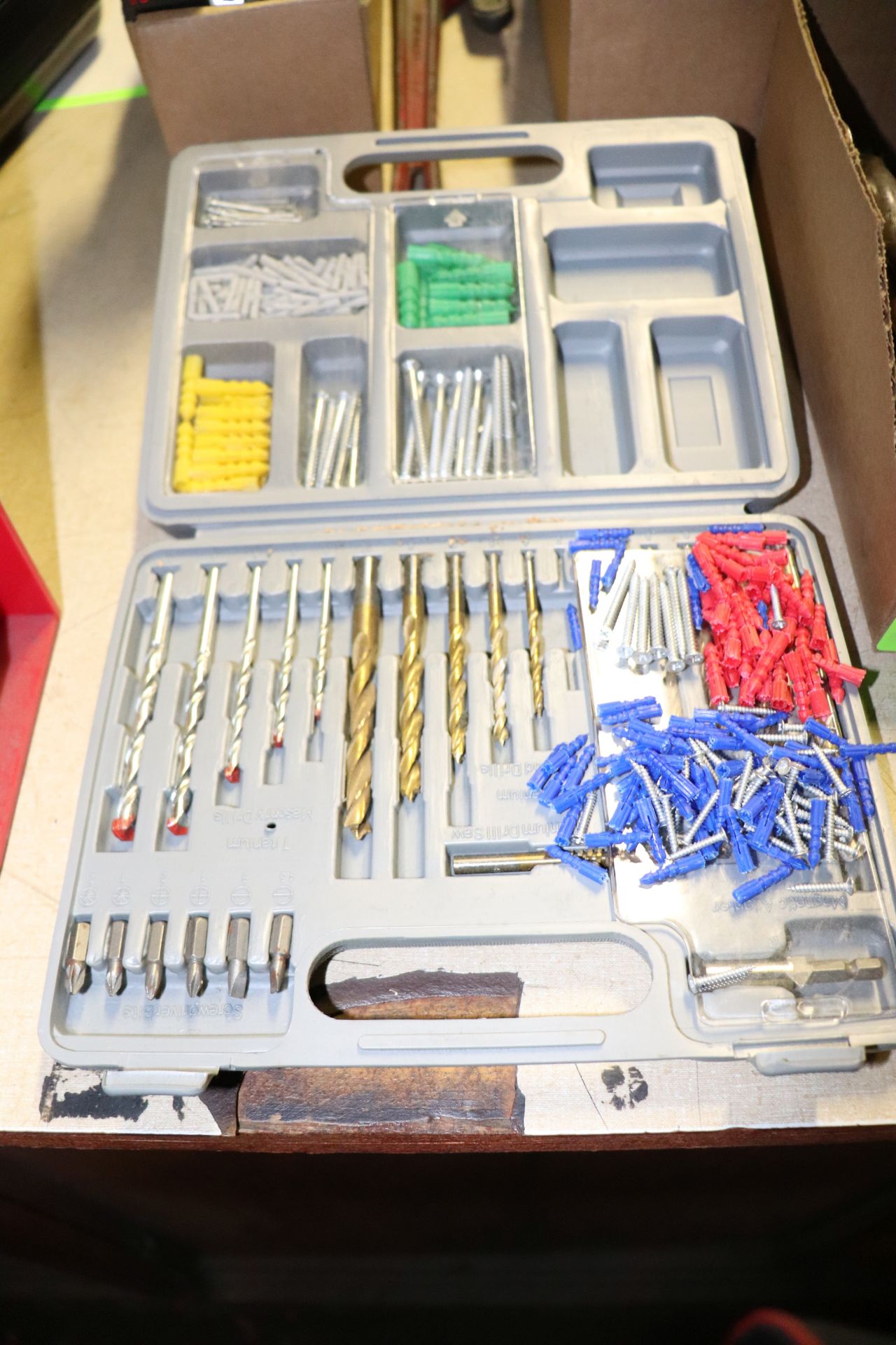 Case with drill bits and screws