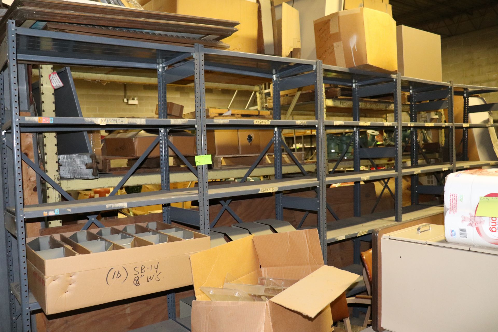 Eight sections of shelving, marked for late removal