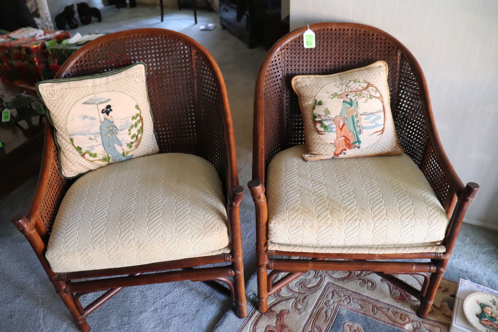 Two wicker back armchairs