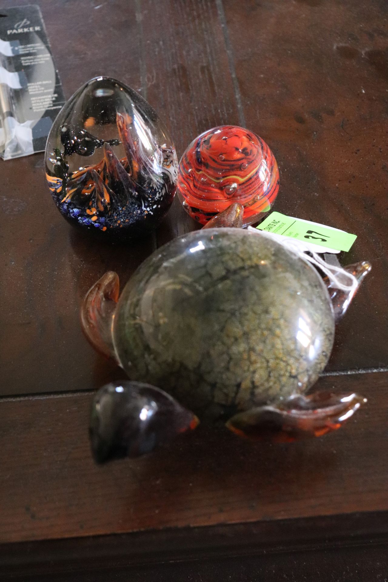 Three paperweights