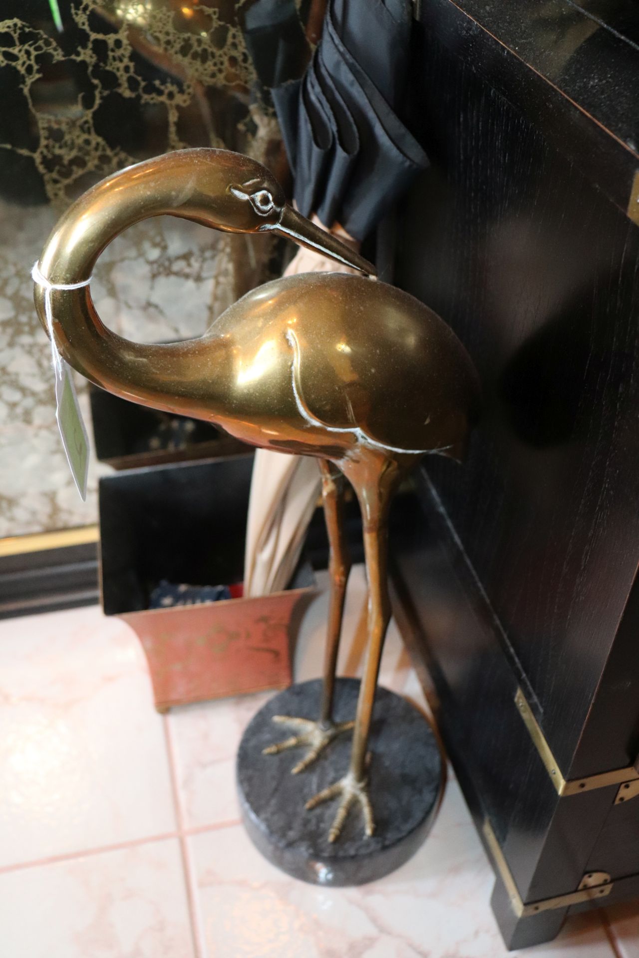 Brass crane on a pedestal, height 2'