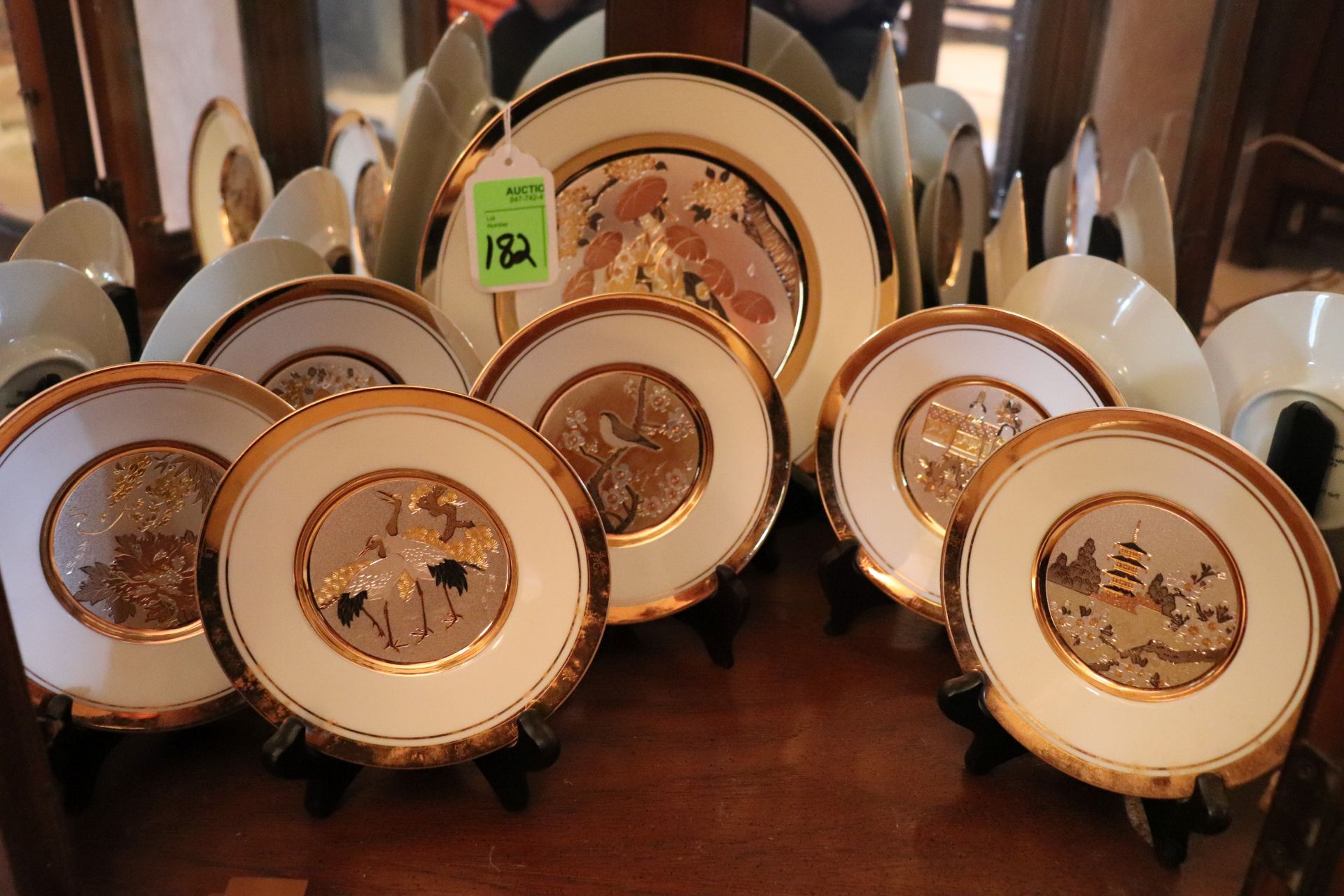 Seven decorative plates from Hamilton Collection with Japanese theme