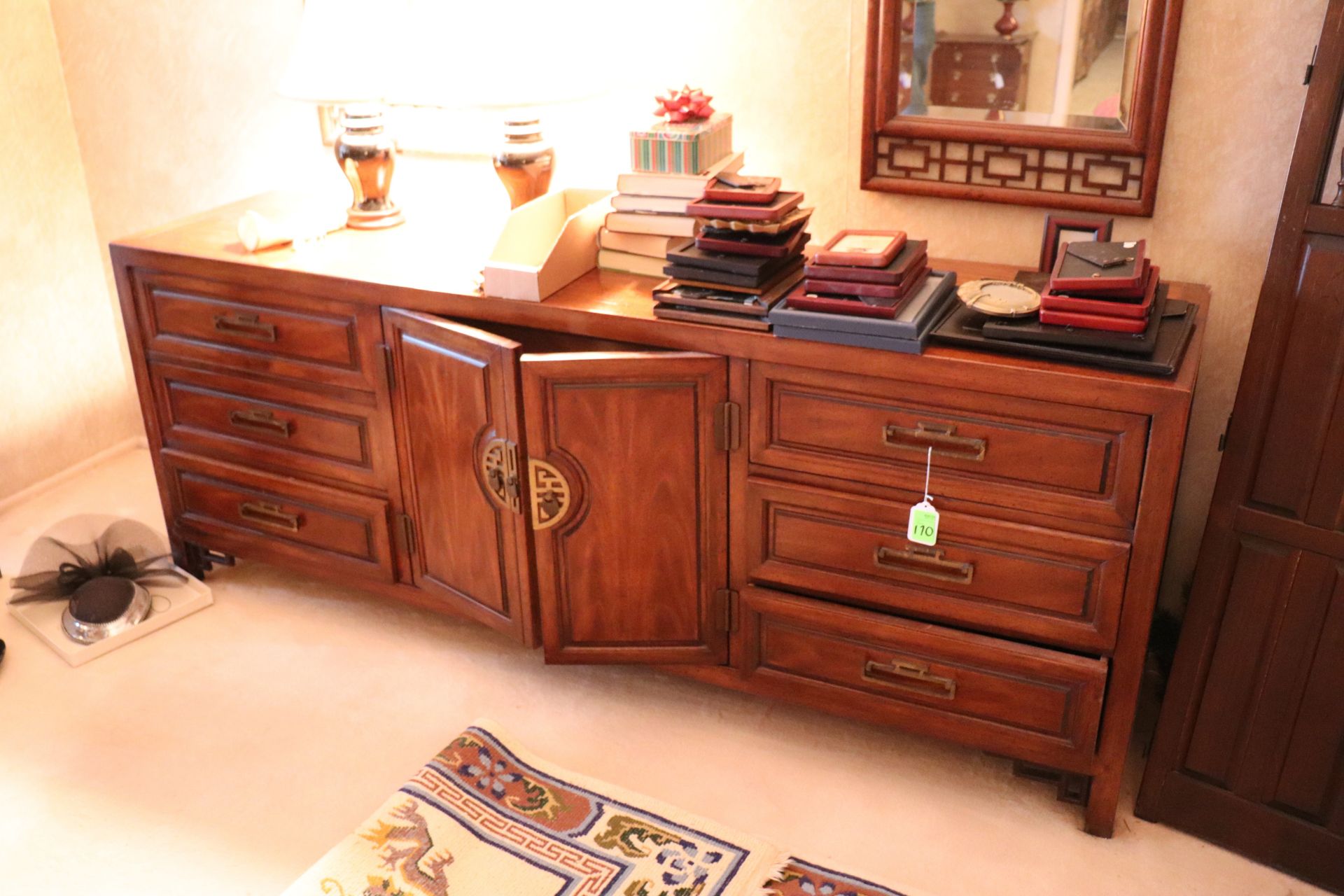 Oriental style dresser with nine drawers, 19" x 78", height 31"