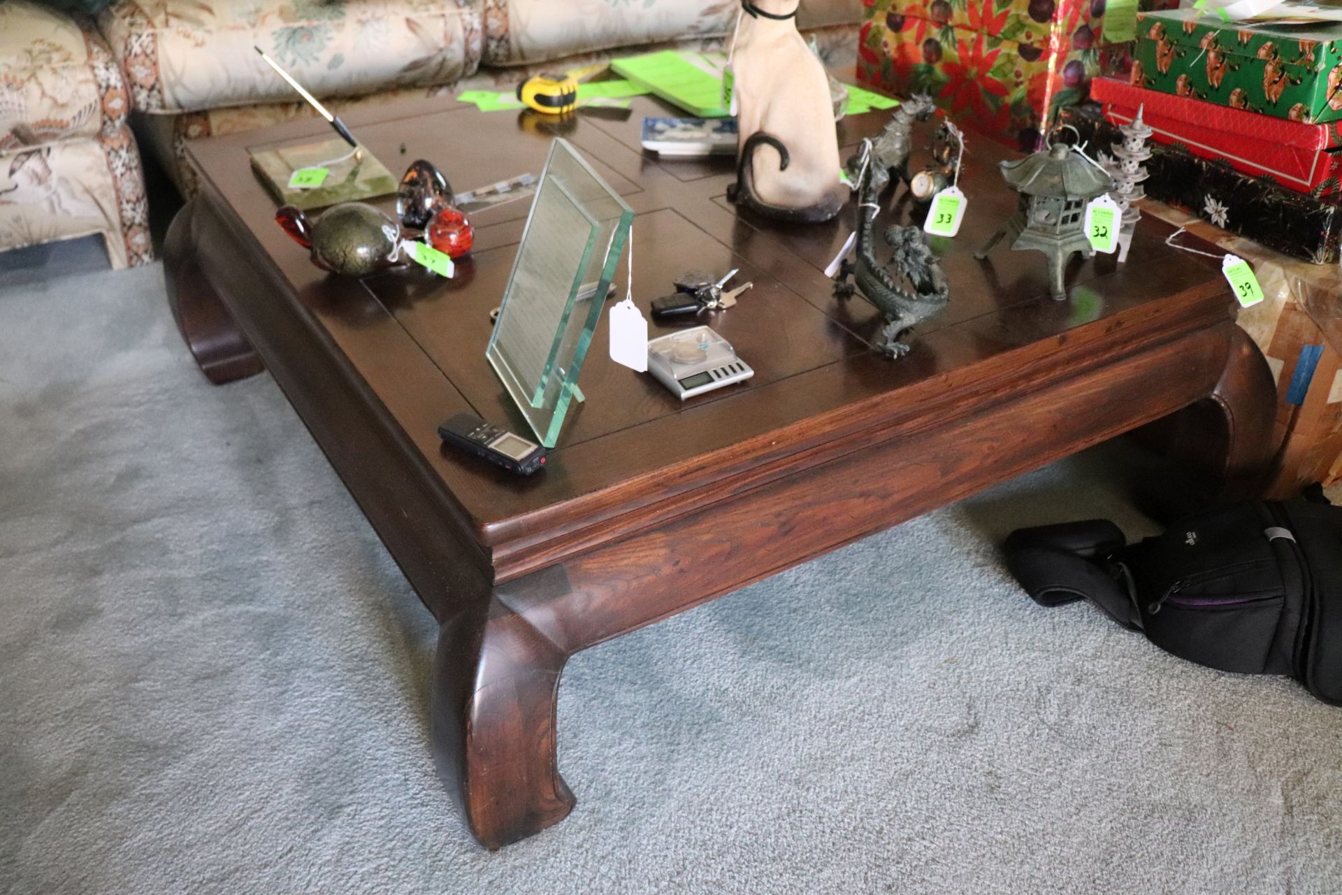 Oriental style coffee table with bowed legs, 42" x 42"