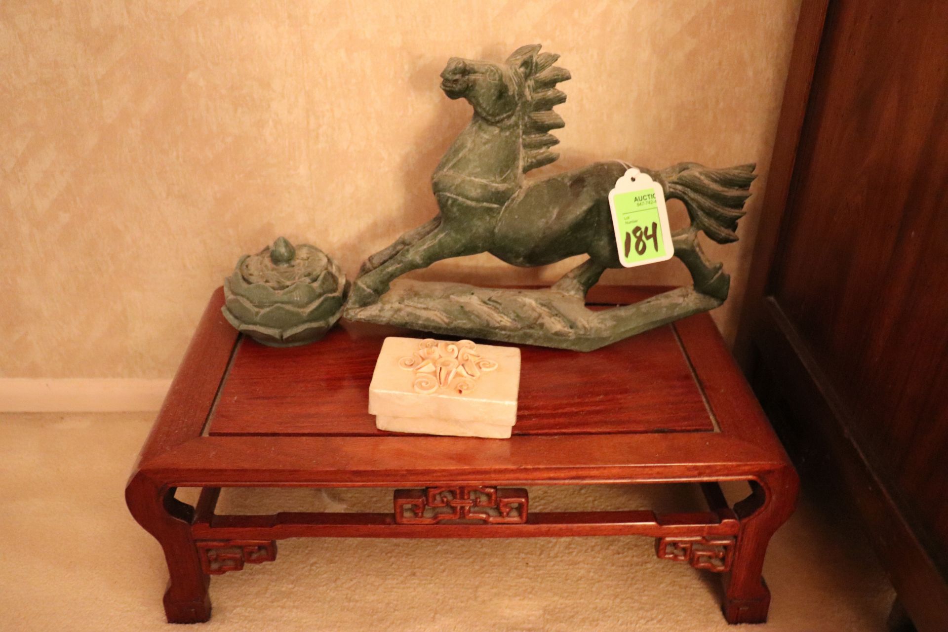 Stand with a jade like horse and incense burner