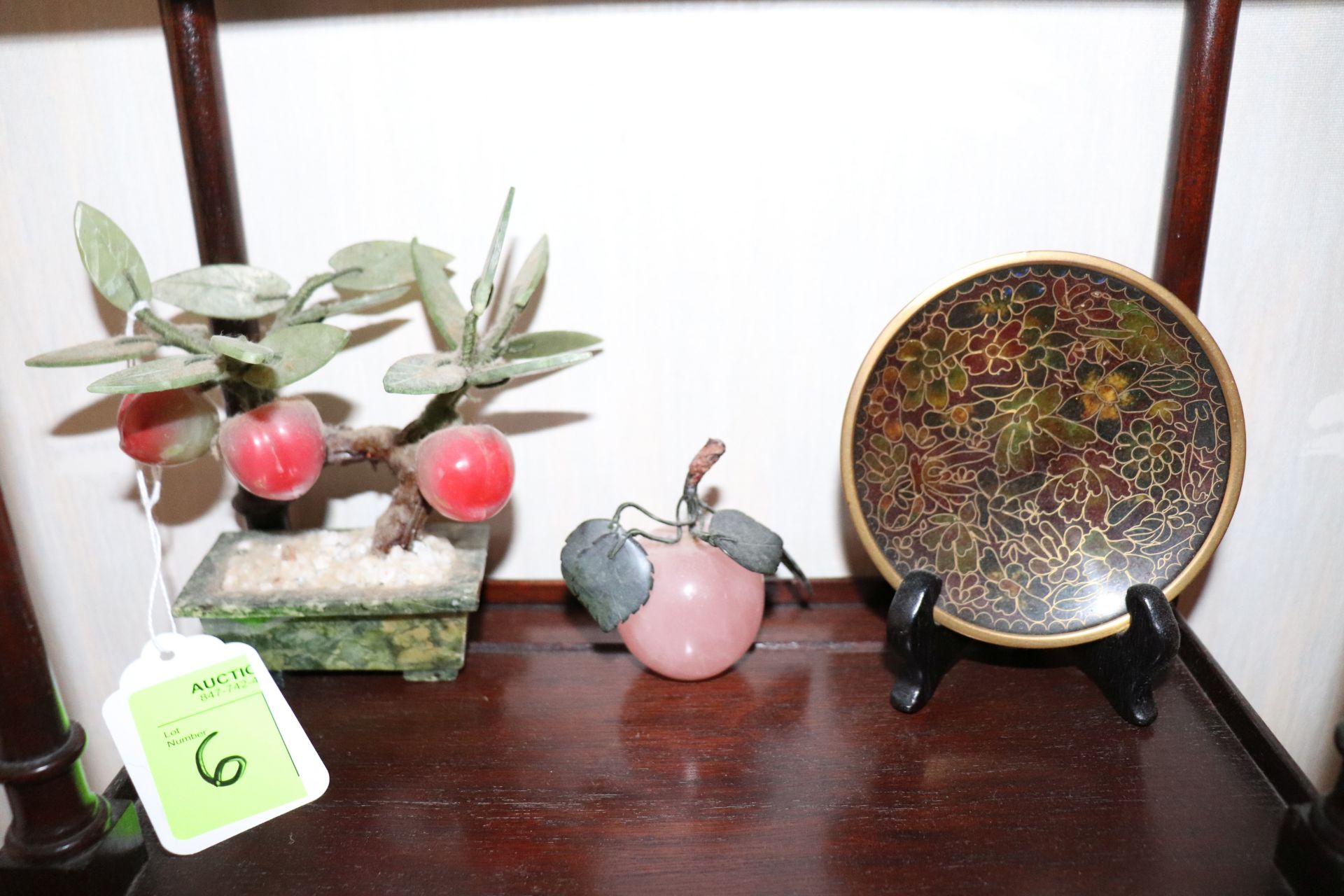 Placque with stand, soapstone fruit, and cherry blossom arrangement