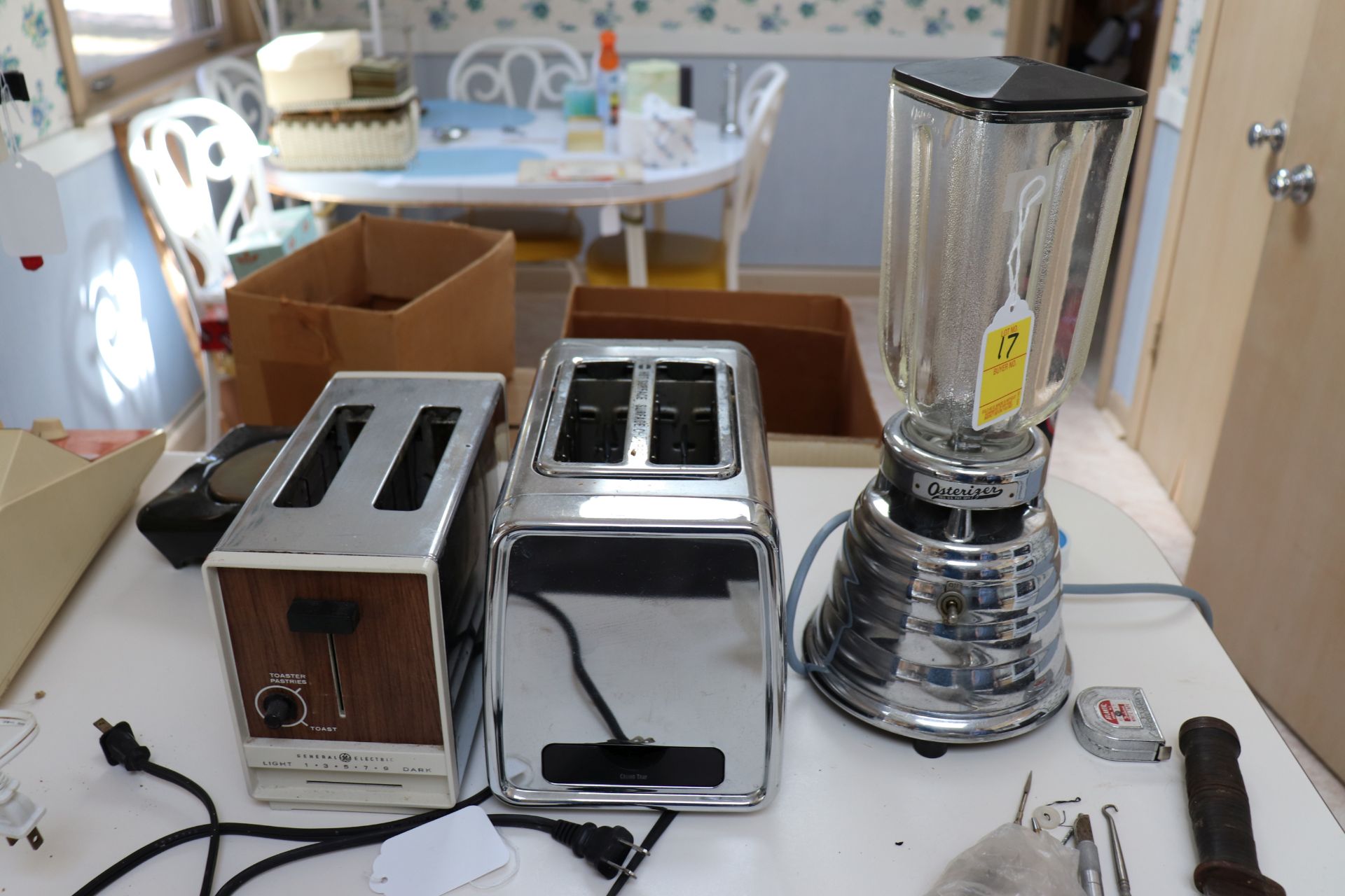 Two toasters, General Electric and Hamilton Beach, and an Osterizer blender