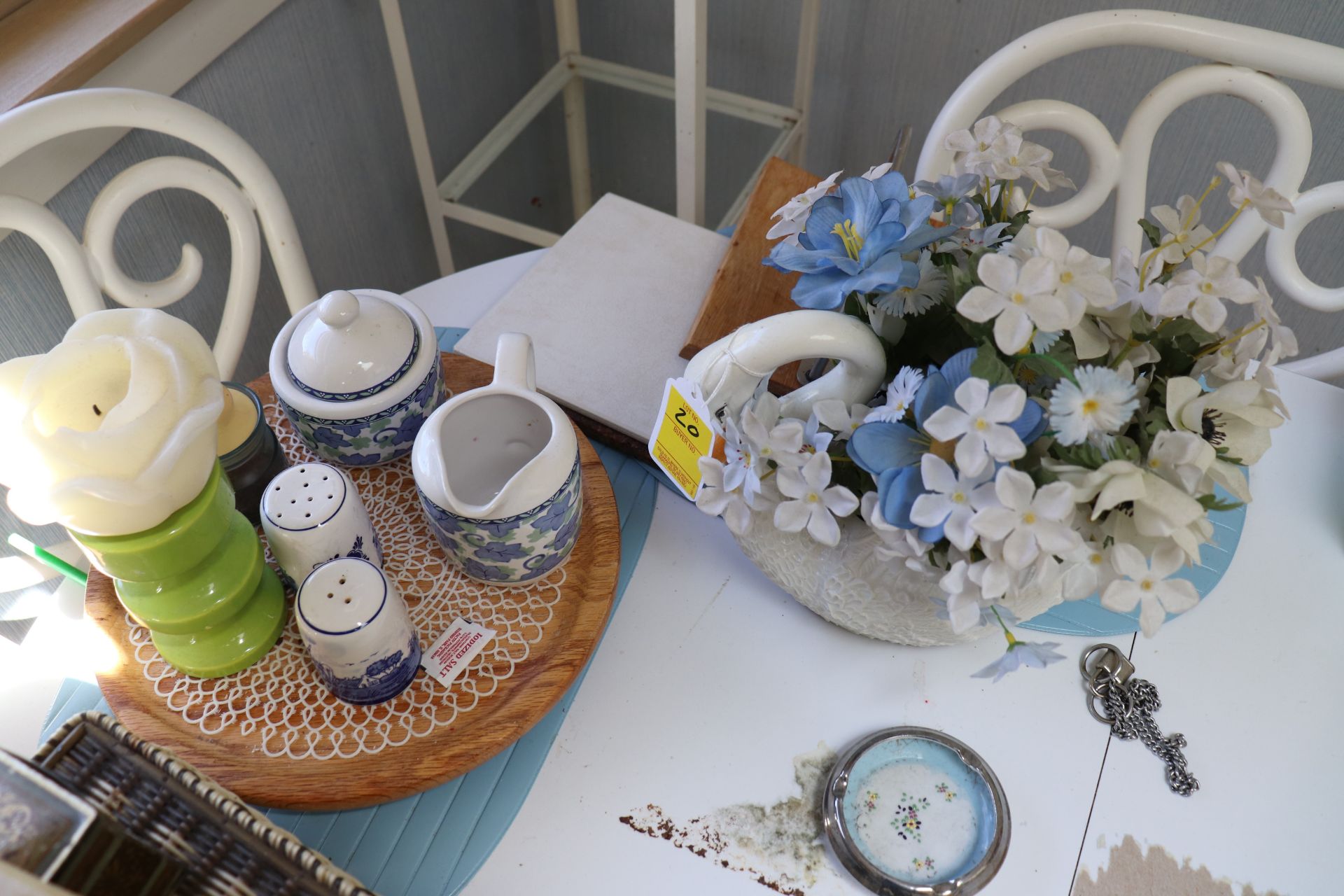 Group: Lazy Susan with salt and pepper shaker and a flower pot goose