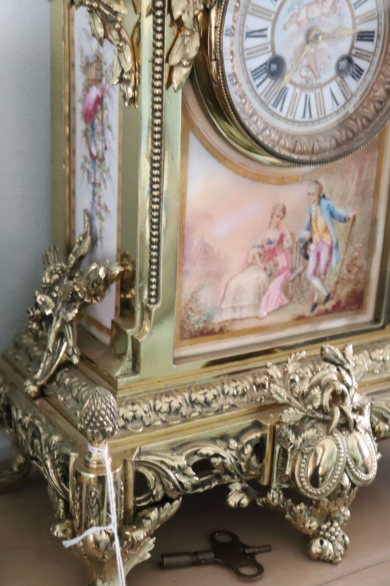 Tiffany & Company New York branch Louis XV style gilt brass and porcelain mantle clock having key wo - Image 3 of 5