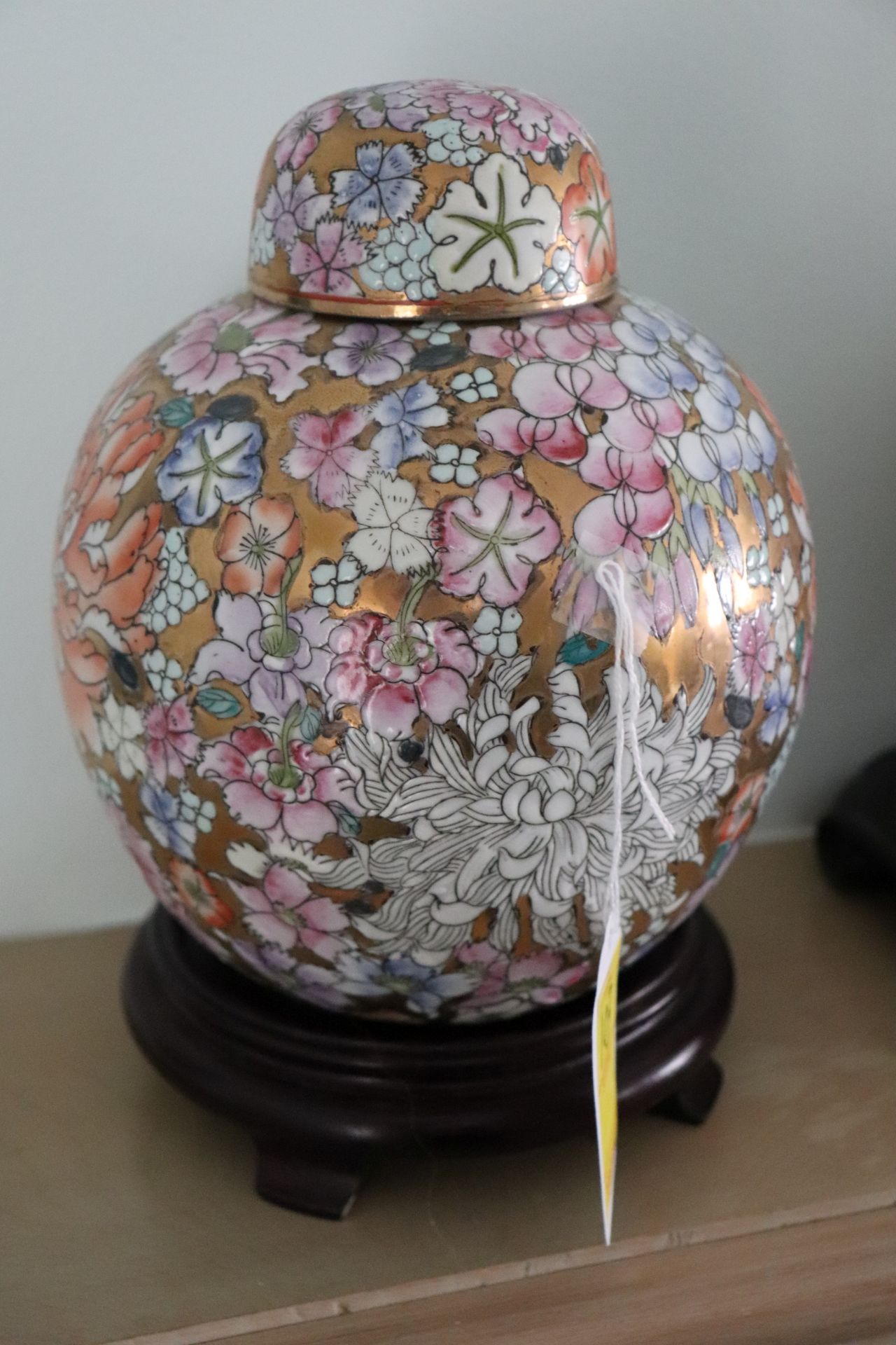 Japanese Satsuma covered vase having floral decoration with gilt highlight, approximate height 9"