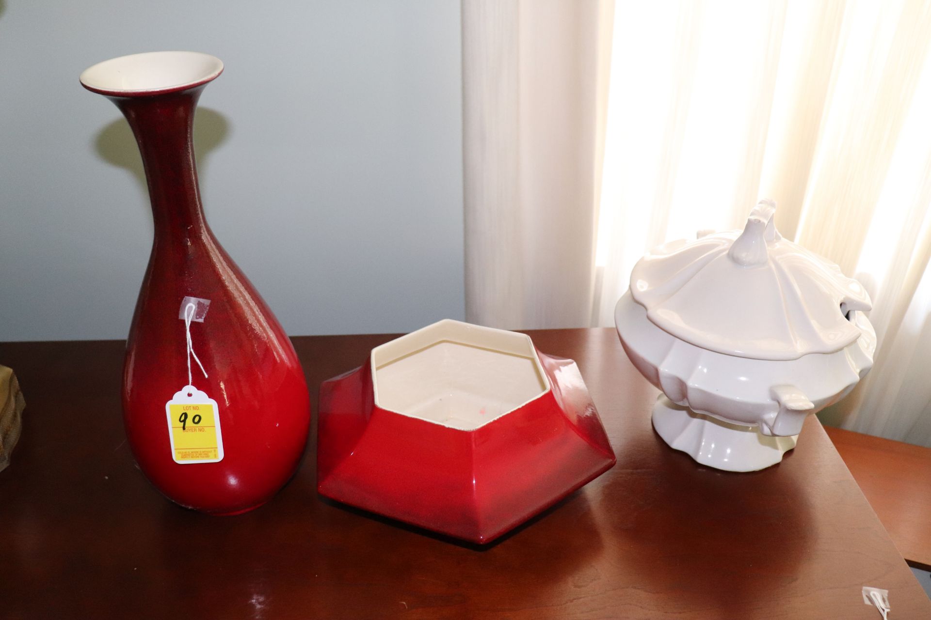 Group: two pieces of Royal Haeger pottery comprising a red to black glazed vase and bowl, approximat