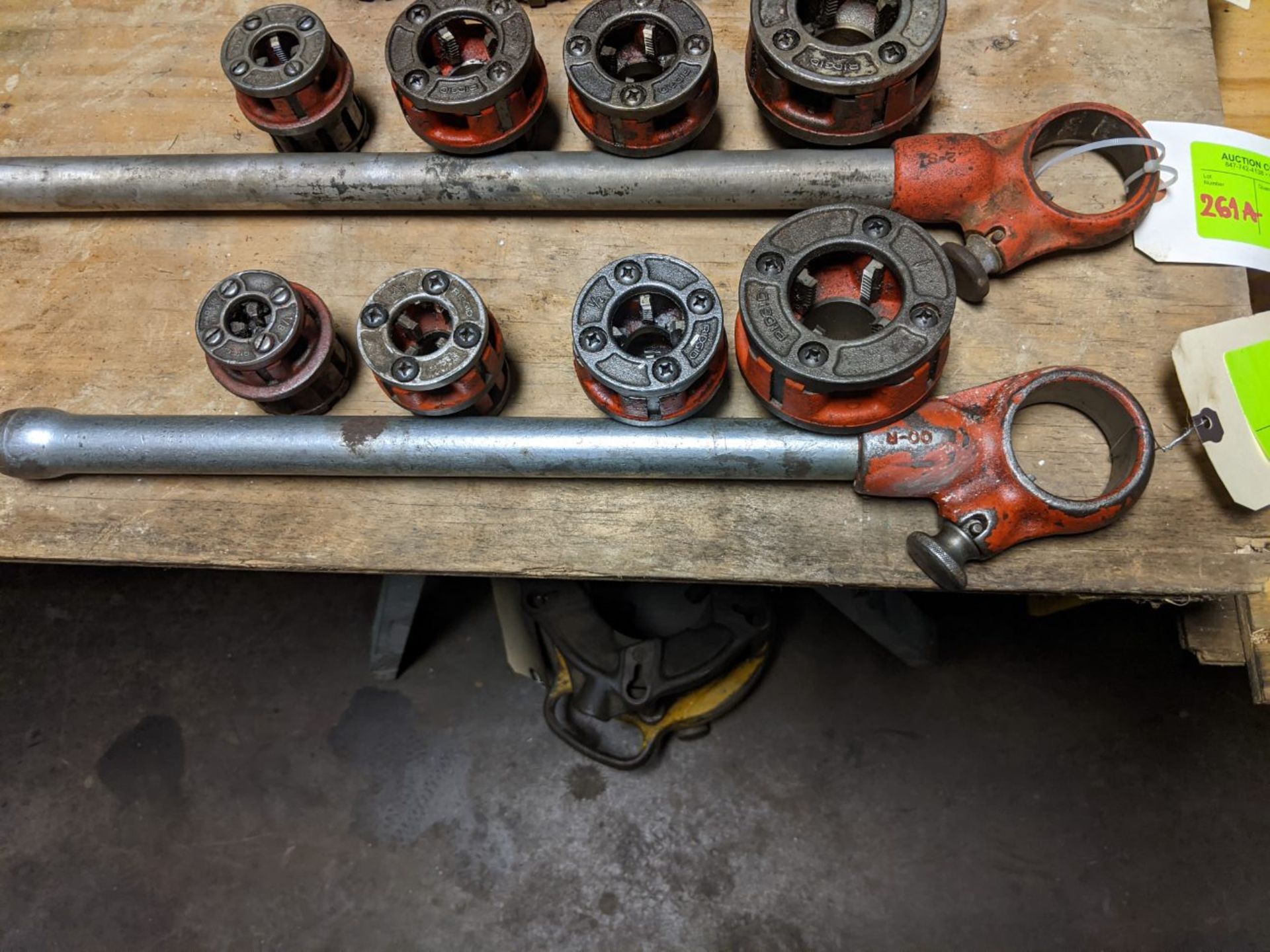 Ridgid pipe threaders with 1/8", 3/8", 1/2" and 1" attachments