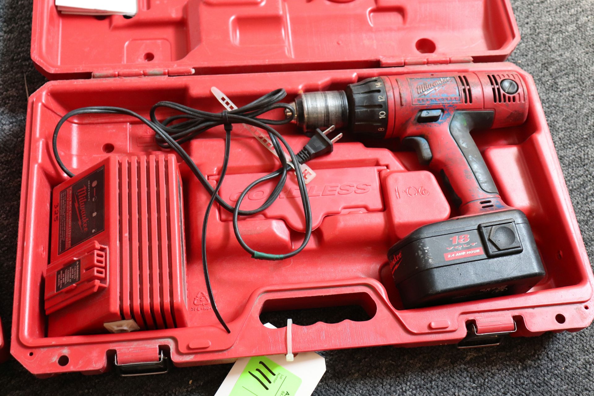 Milwaukee 18 volt heavy duty drill with Milwaukee 1-hour charger, battery operated, in case