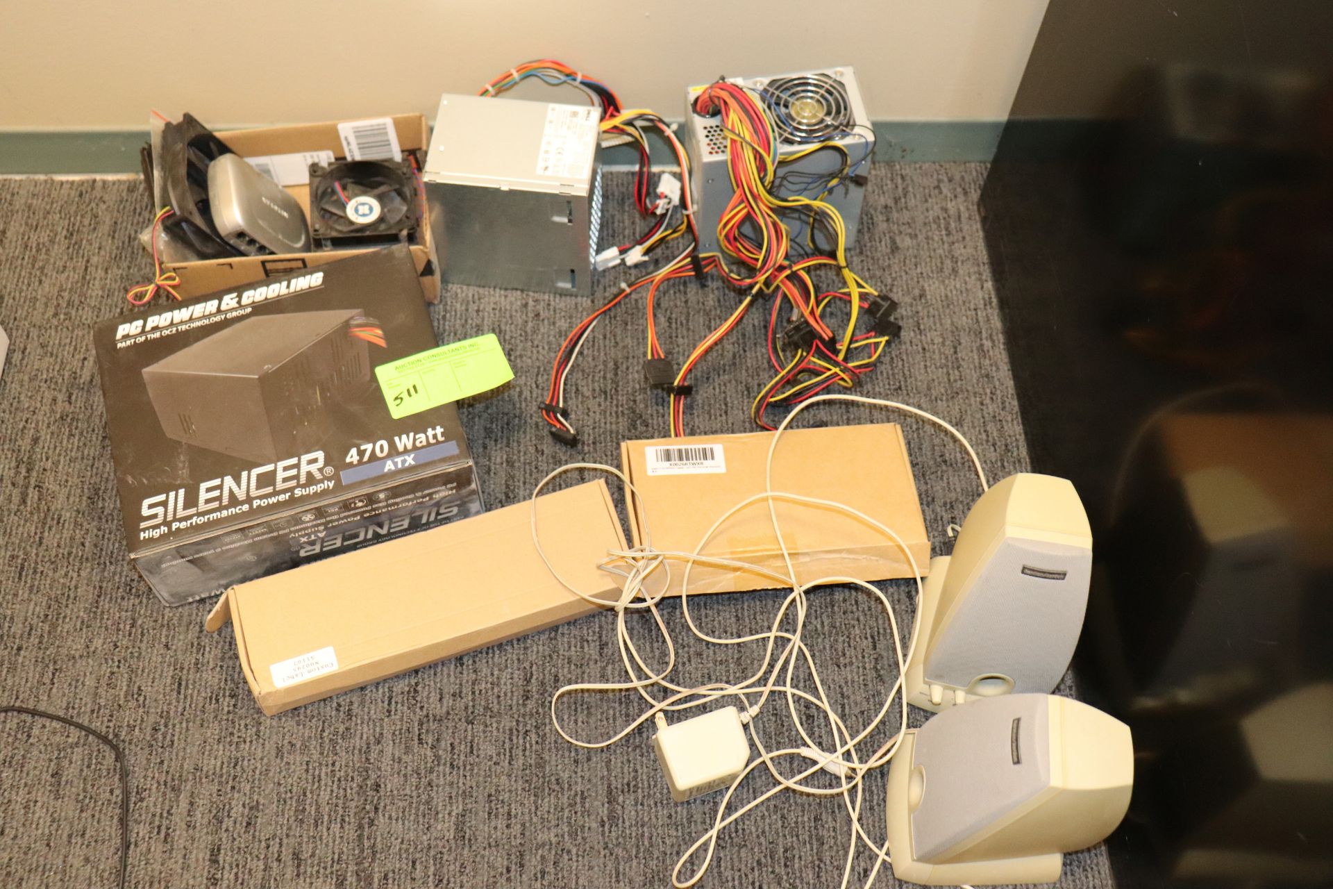 Three power supplies for desktop, two laptop batteries, and various components