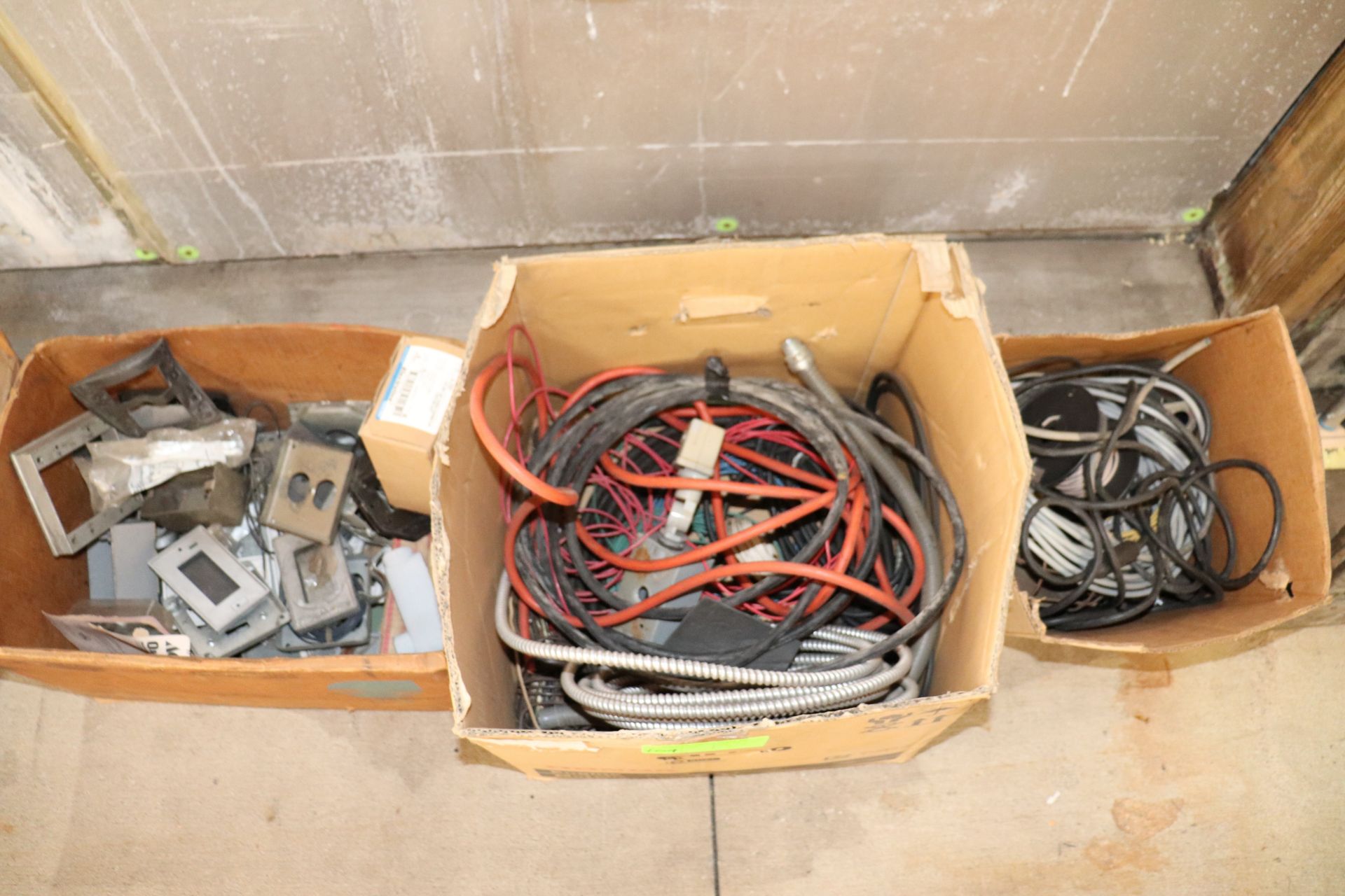 Three boxes of miscellaneous electrical supplies