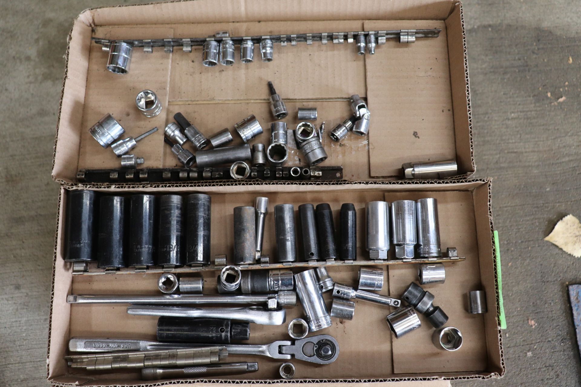 Set of Craftsman standard sockets, socket wrenches, socket extensions, and other miscellaneous socke