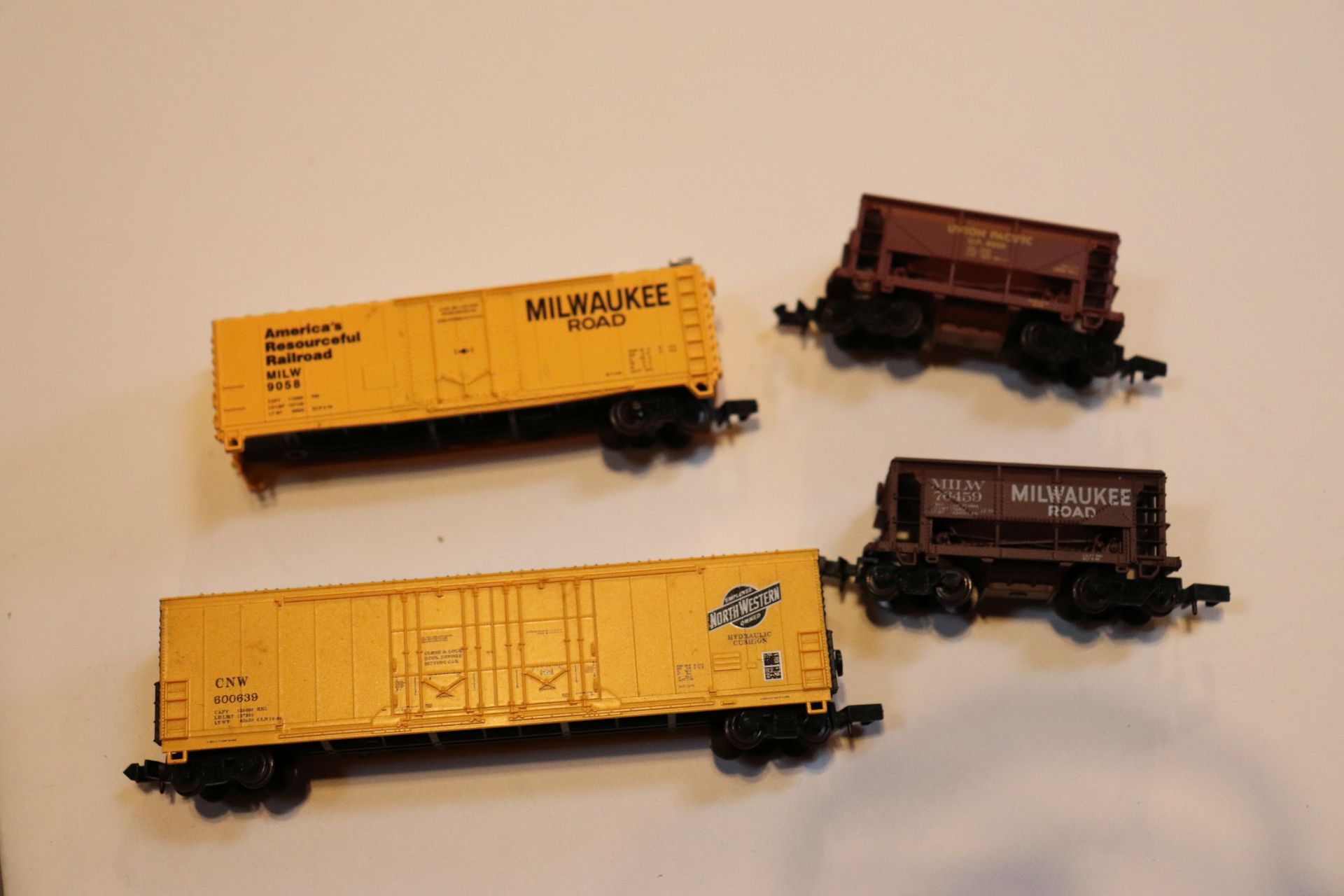 Four Milwaukee Road train cars by Atlas, N scale