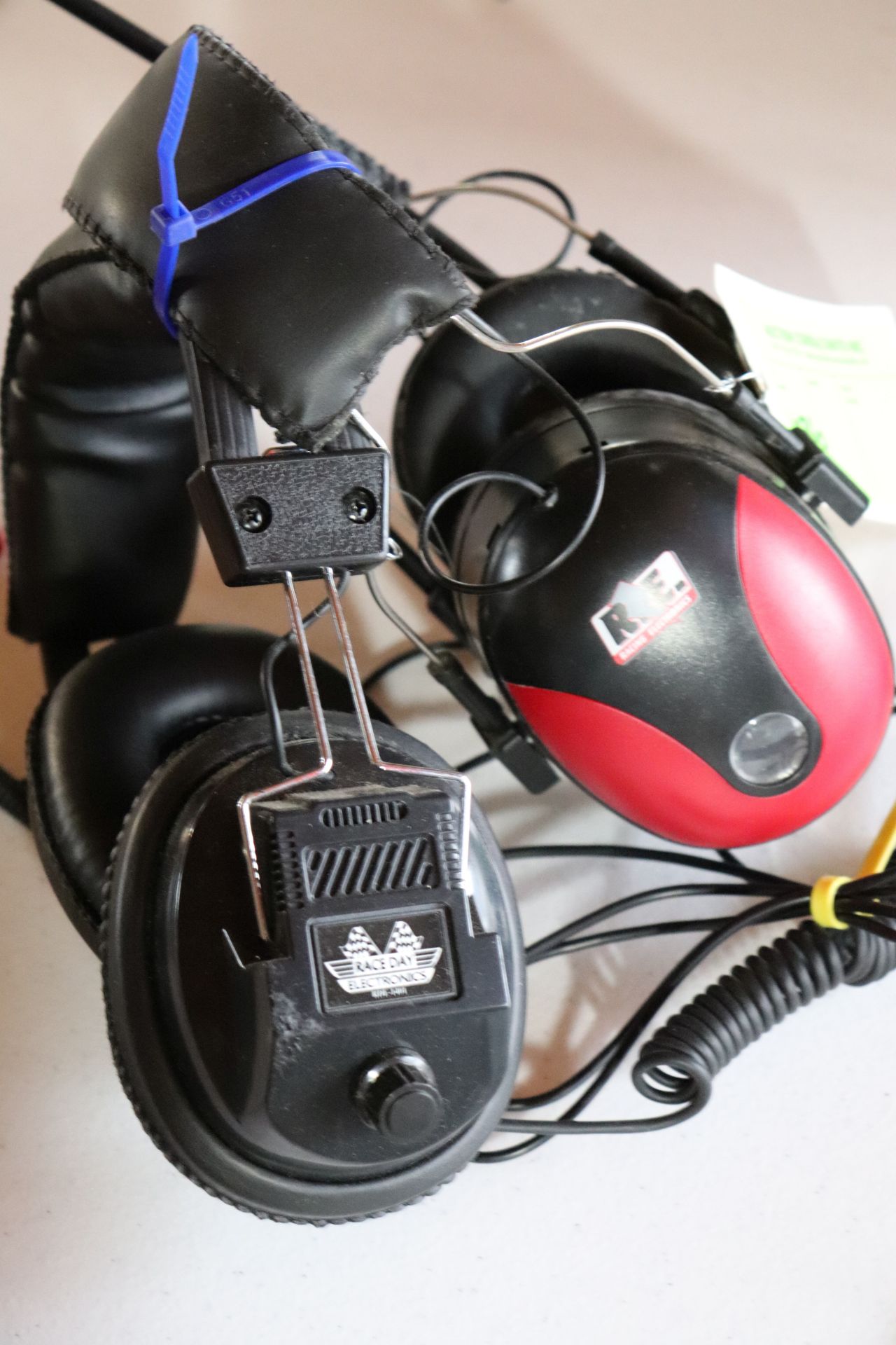 2 headsets. Racing electronics and Raceday electronics