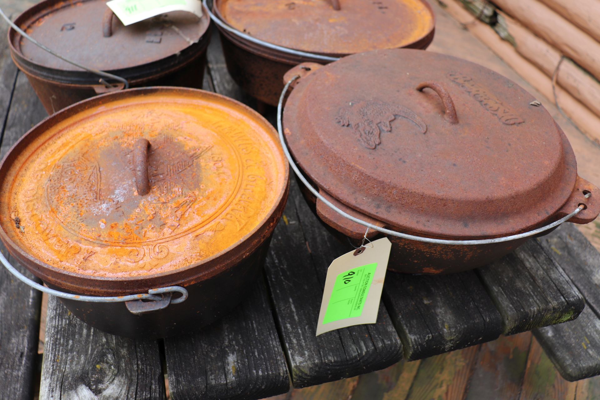 15" Bayou Classic cast iron pot and 12" Louis & Clark cast iron pot