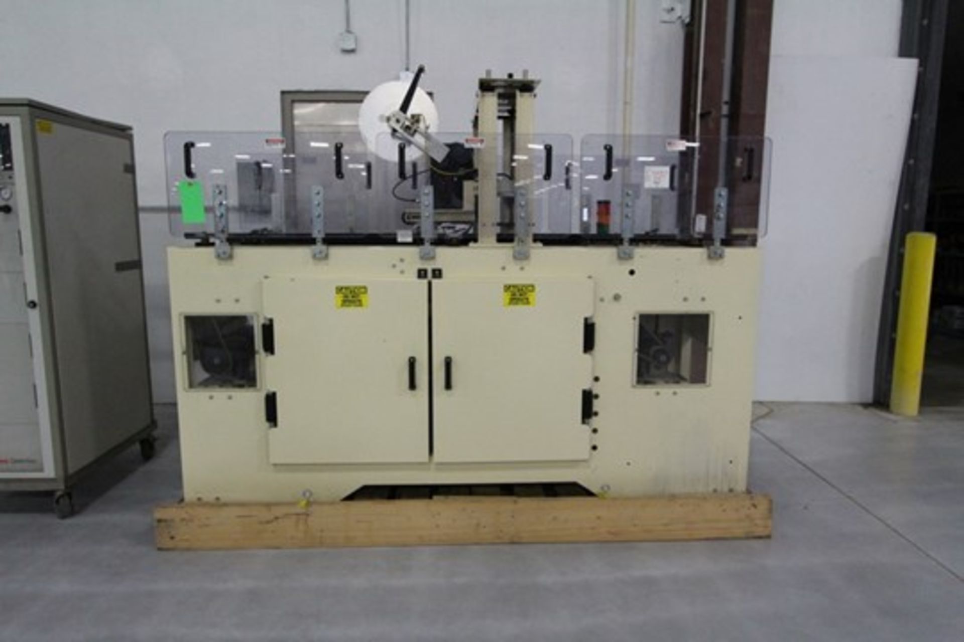 Klippenstein High Level Adjustable Tape Case SealerModel SK600TH, Taped Two Fridge Packs Together to