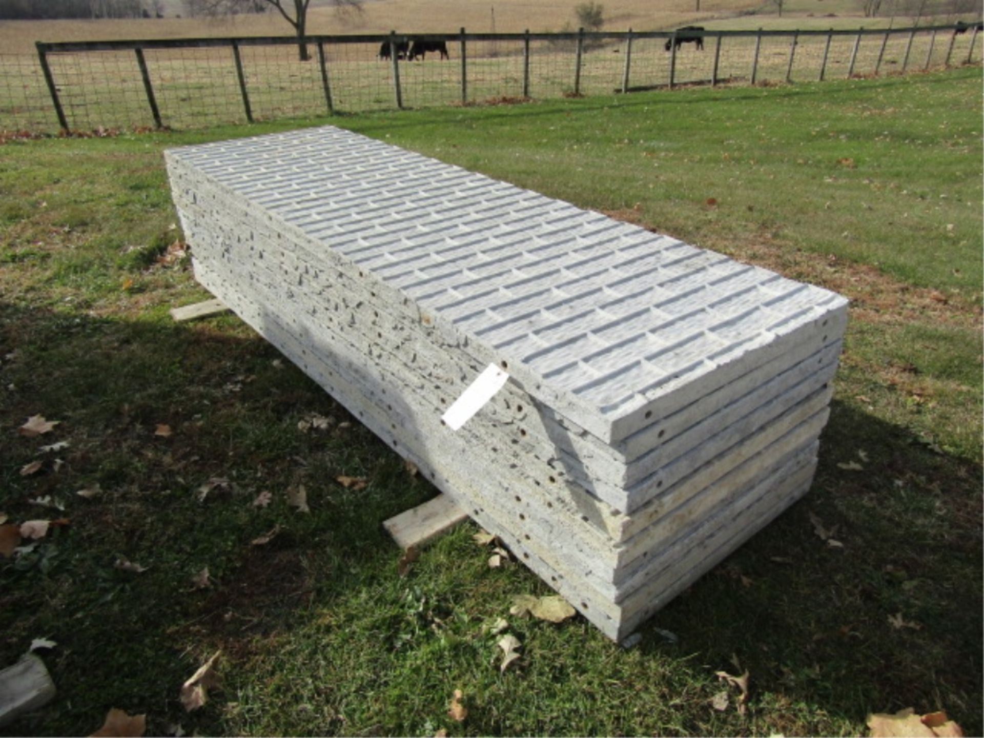 (10) 32" x 9' Precise Concrete Forms, Textured Brick 8" Hole Pattern, Located in Winterset, IA