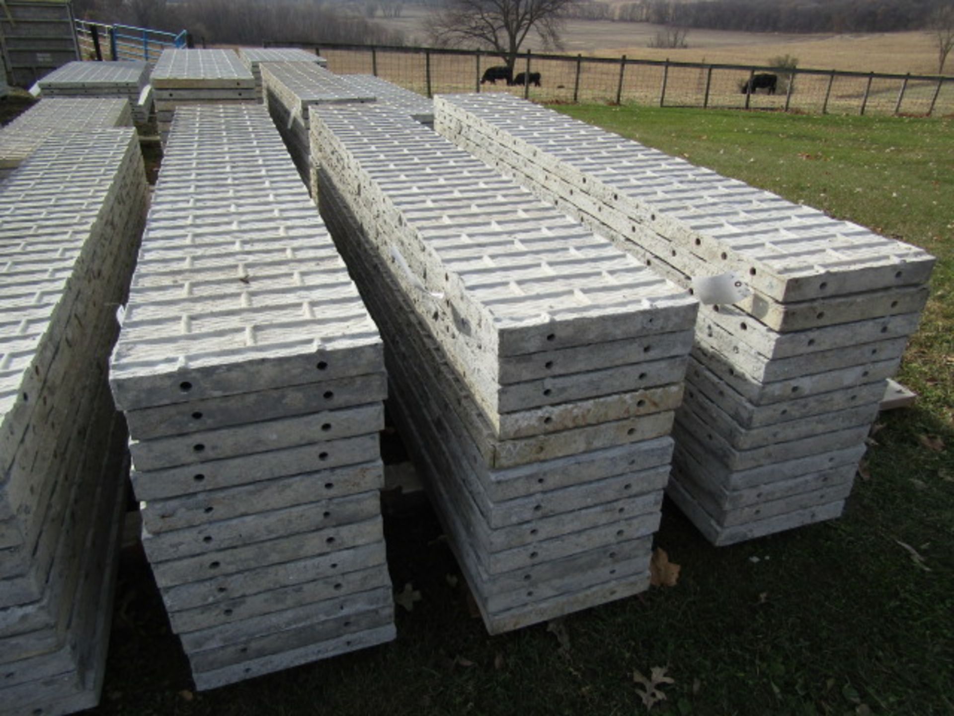 (12) 16" x 9' Precise Concrete Forms, Textured Brick 8" Hole Pattern, Located in Winterset, IA