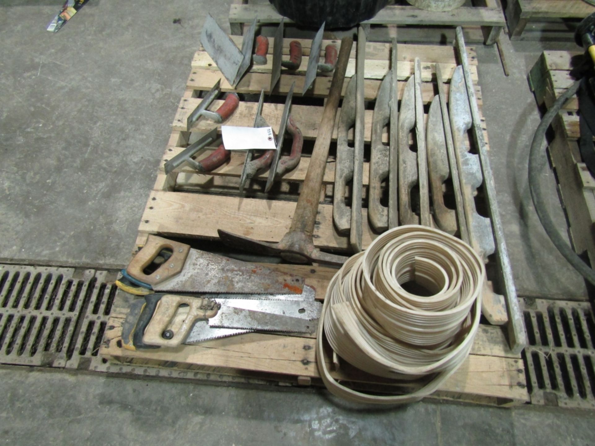 Pallet of Miscellaneous Hand Trowels, Axe, Saws, & Edging, Located in Winterset, IA