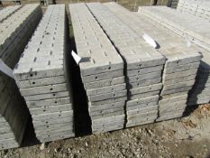 (12) 12" x 8' Corners Precise Concrete Forms, Textured Brick 8" Hole Pattern, Located in