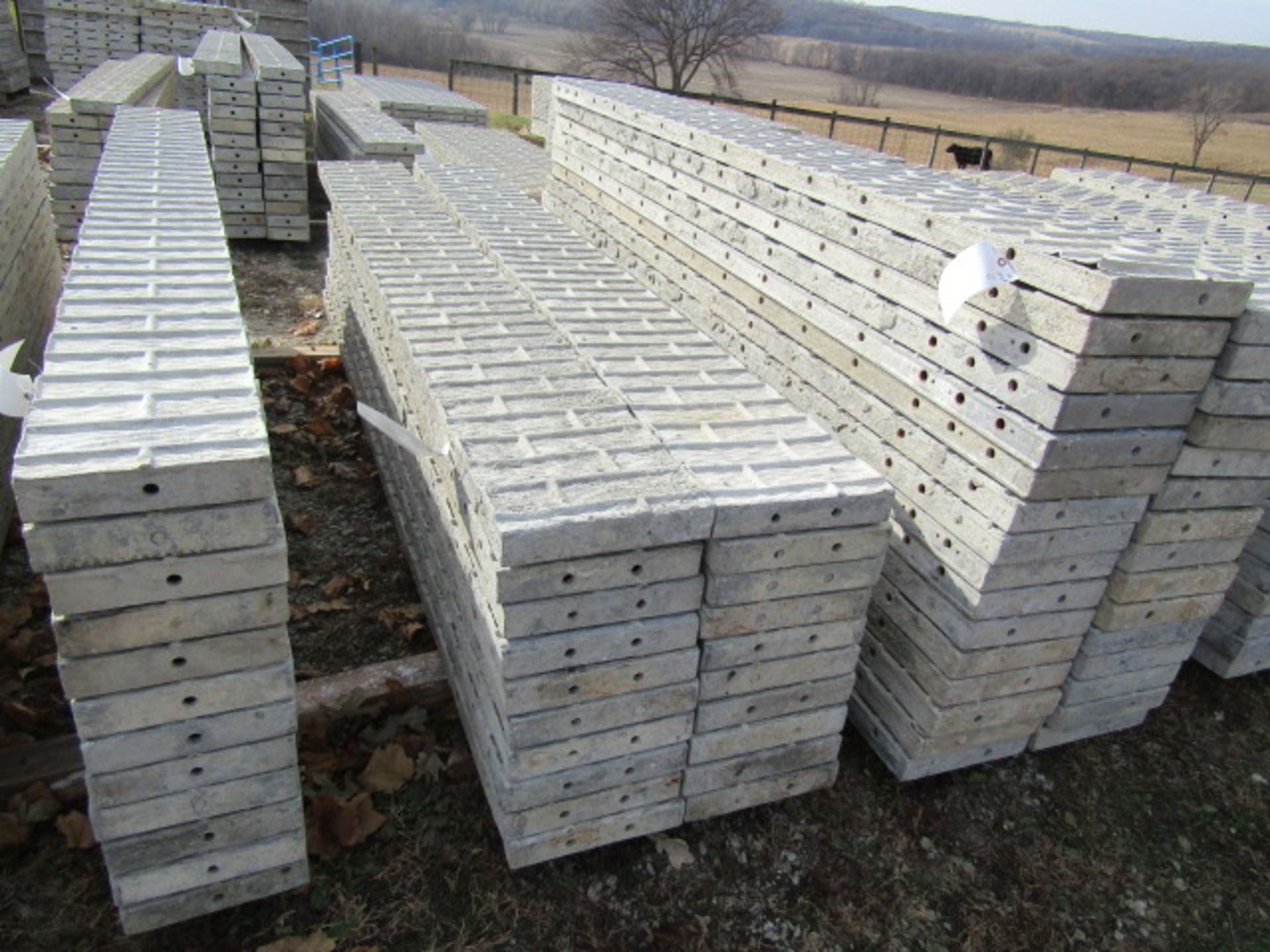 (10) 12" x 9' Precise Concrete Forms, Textured Brick 8" Hole Pattern, Located in Winterset, IA