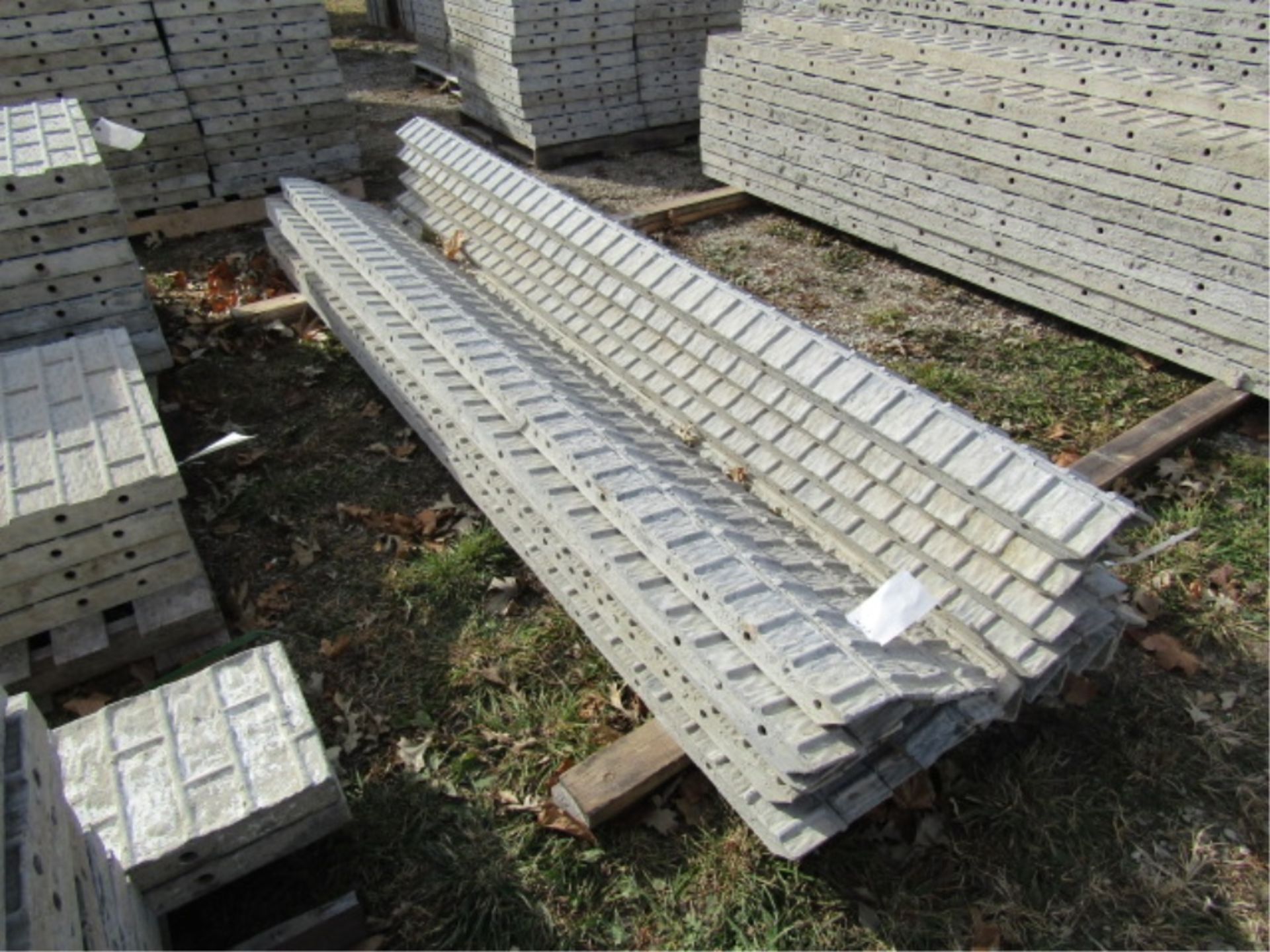 (8) 9' Hinged ISC Precise Concrete Forms, Textured Brick 8" Hole Pattern, Located in Winterset, IA