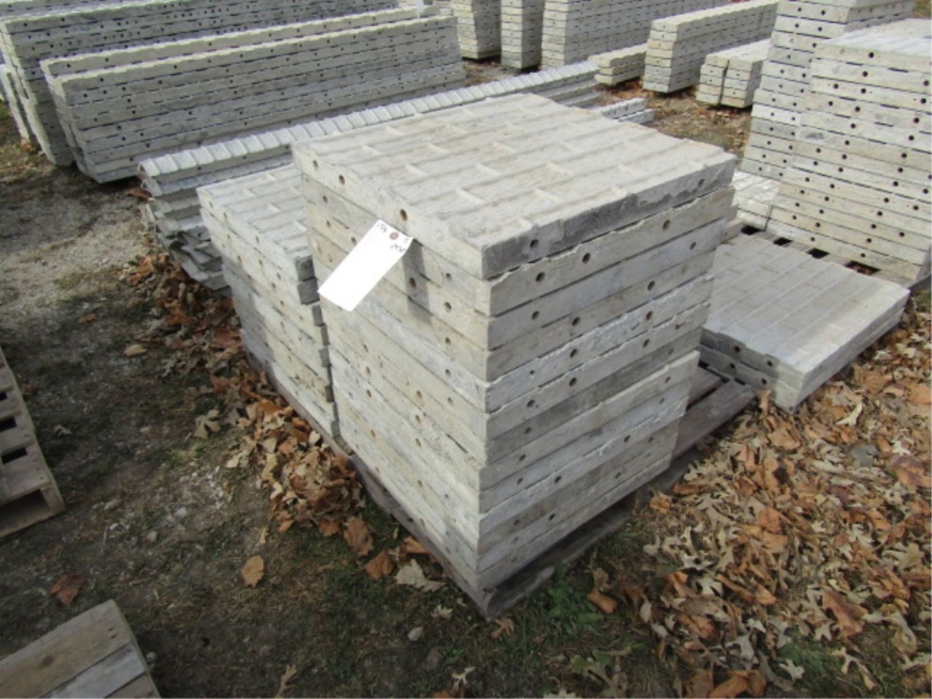(13) 24" x 2' Precise Concrete Forms, Textured Brick 8" Hole Pattern, Located in Winterset, IA