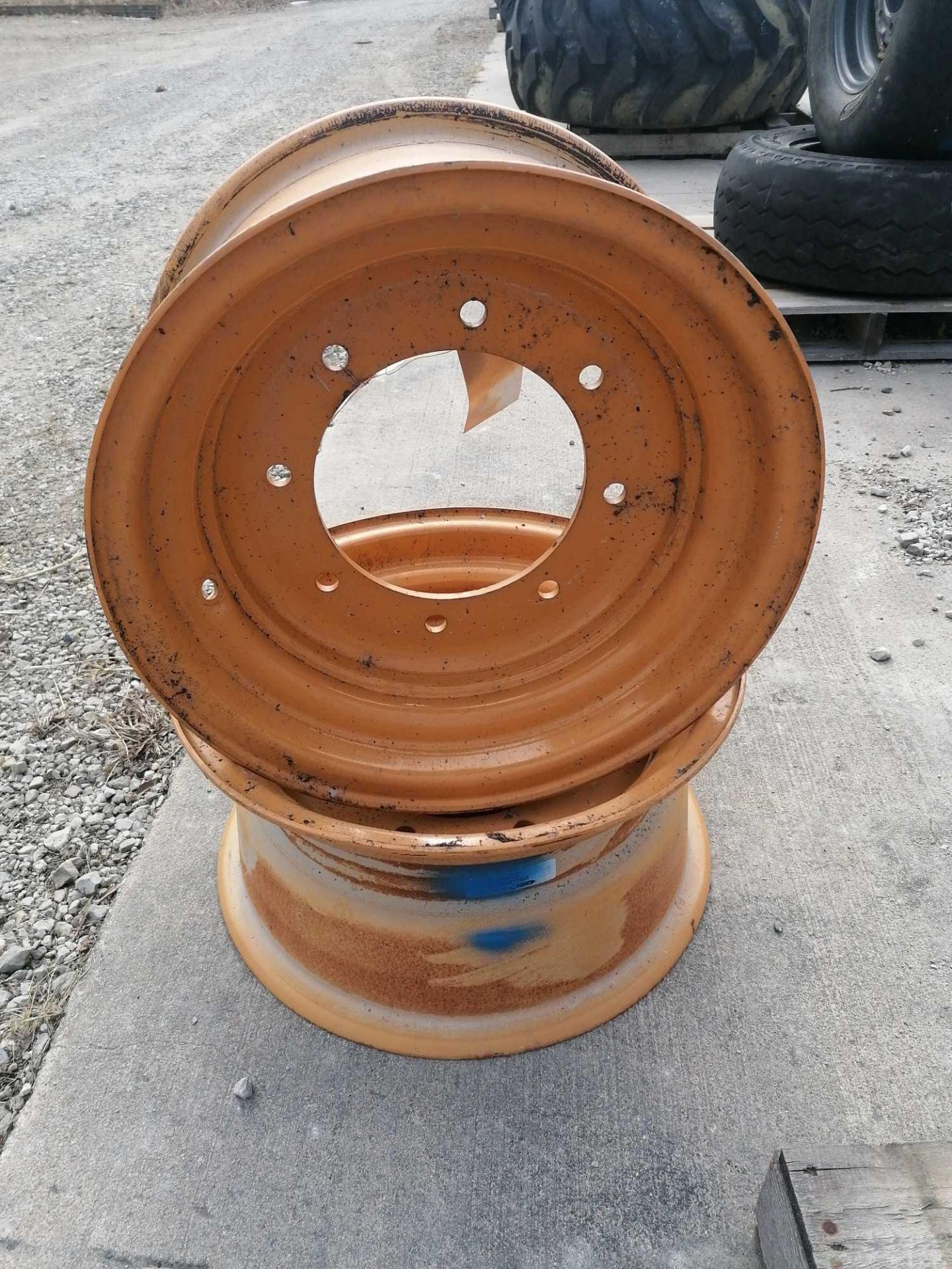 (2) 18X9 Backhoe Rim for a 12X16.5 tire with 8 Bolt Pattern.