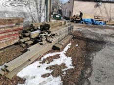 (3) Bundles of Structural Wood Timbers.