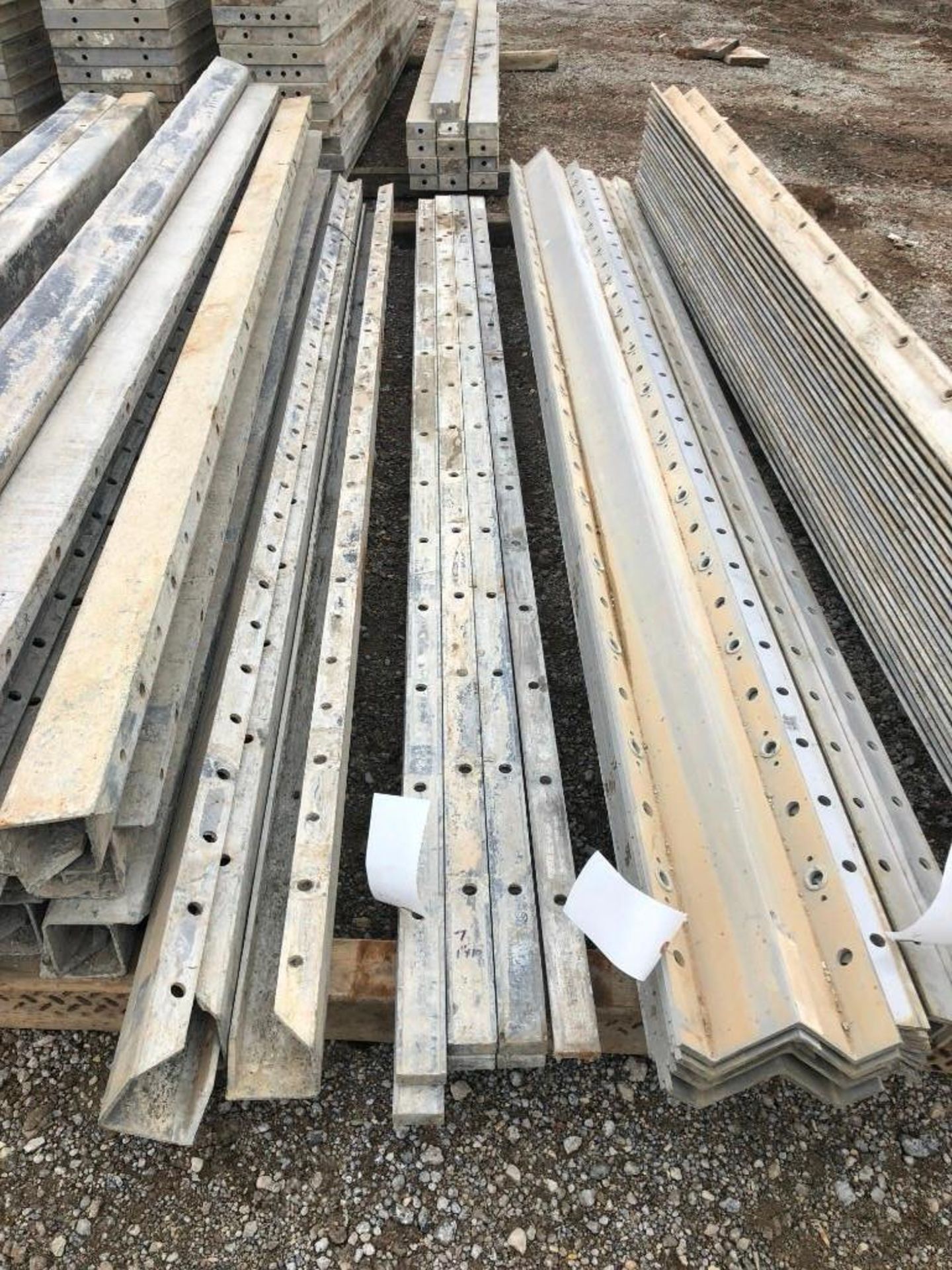 (6) 1" x 10' & (3) 1/2" x 10' Precise Aluminum Concrete Forms, Smooth 8" Hole Pattern. Located