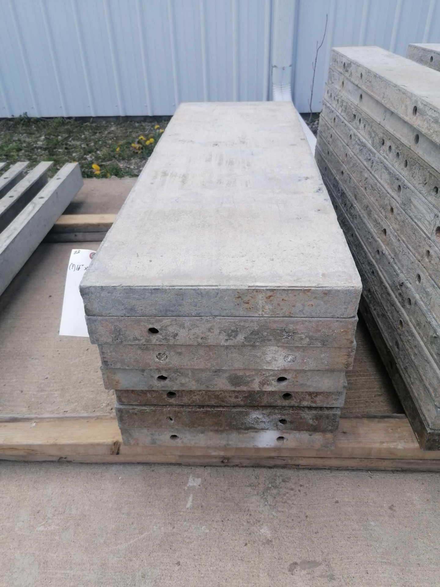 (7) 16" x 4' Durand Aluminum Concrete Forms, Smooth 8" Hole Pattern. Located at 301 E Henry