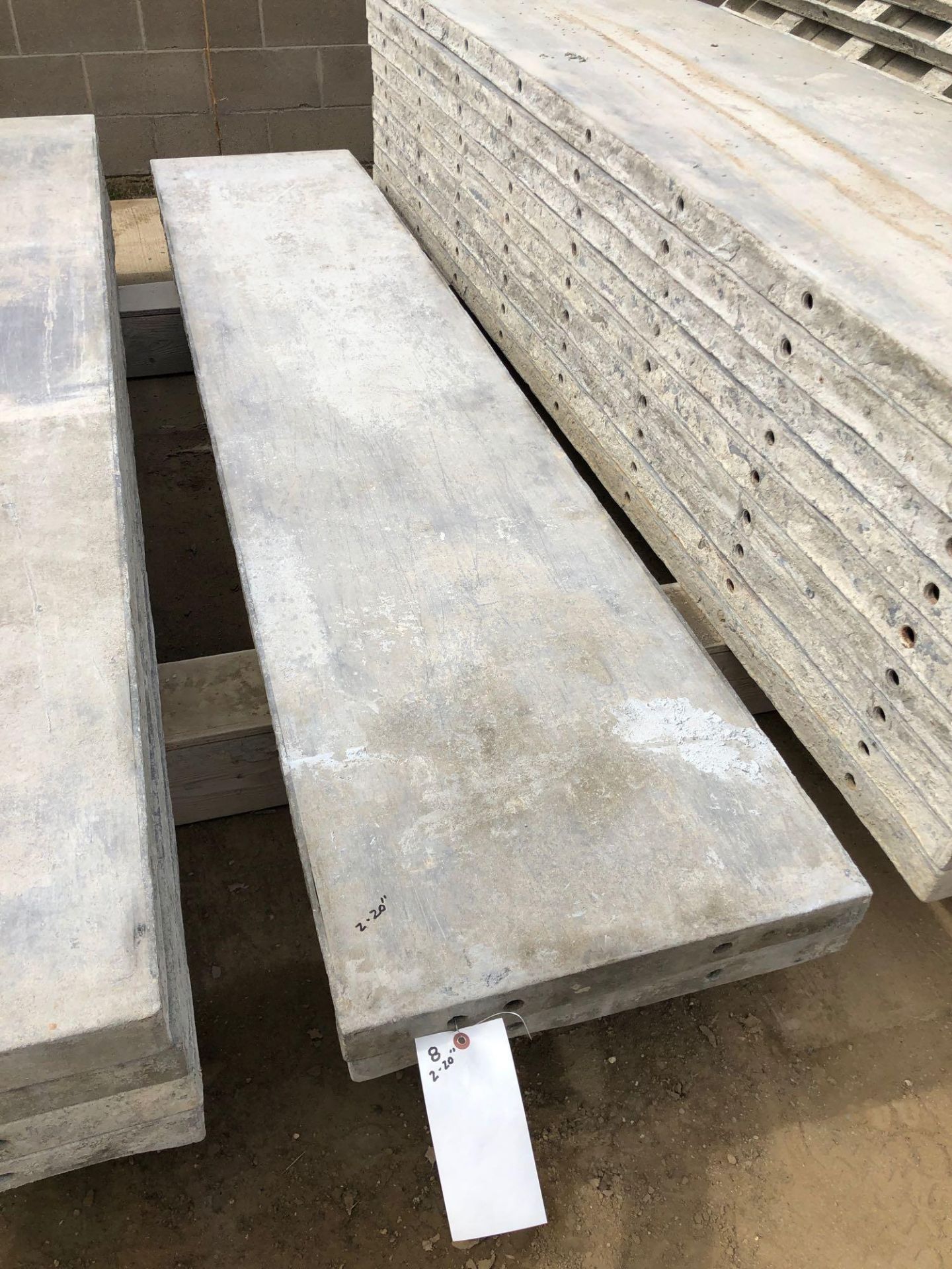 (2) 20" x 8' Wall-Ties Aluminum Concrete Forms, Smooth 6-12 Hole Pattern. Located at 6180 W 10th St,