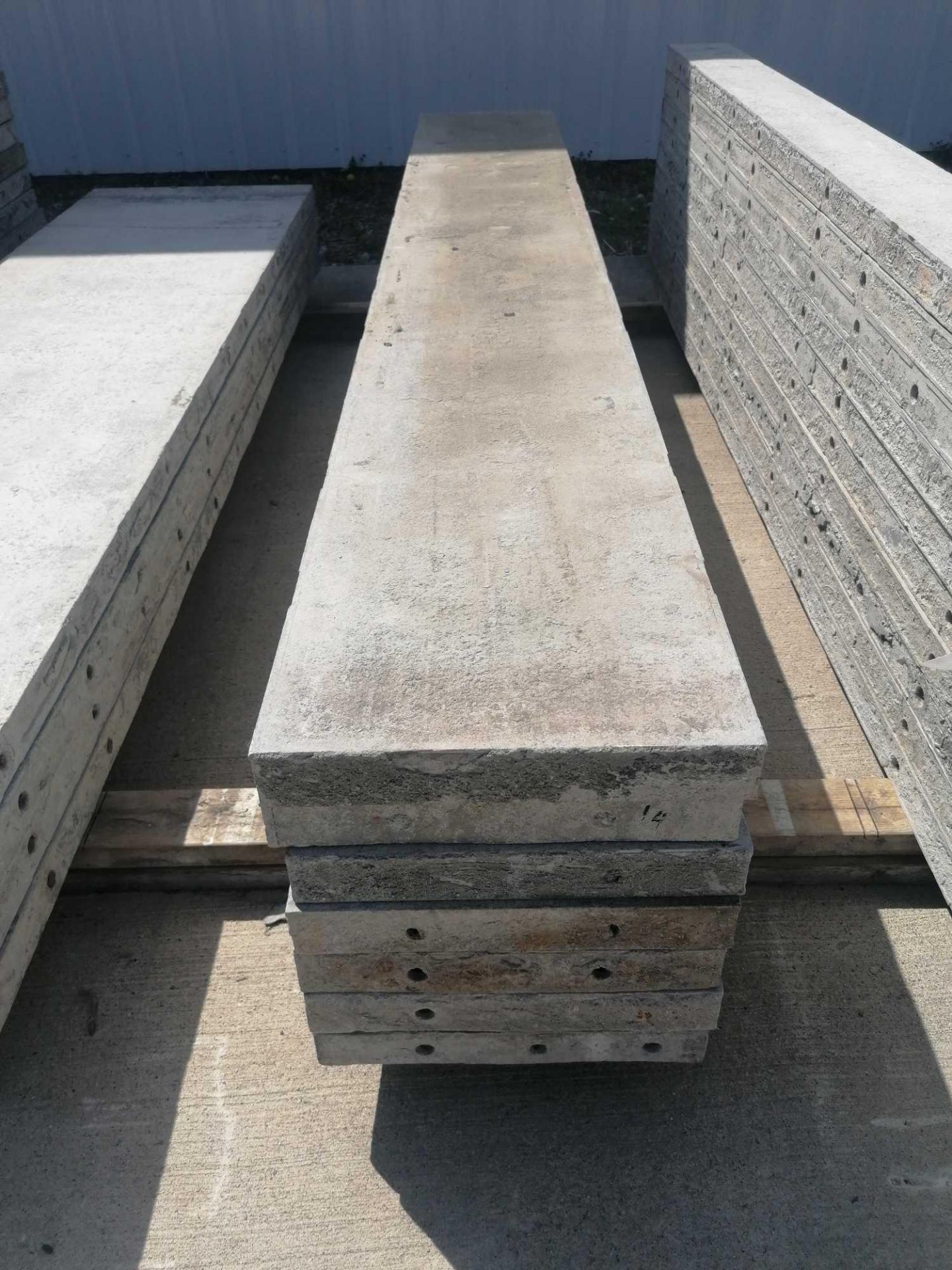(7) 14" x 8' Durand Aluminum Concrete Forms, Smooth 8" Hole Pattern. Located at 301 E Henry