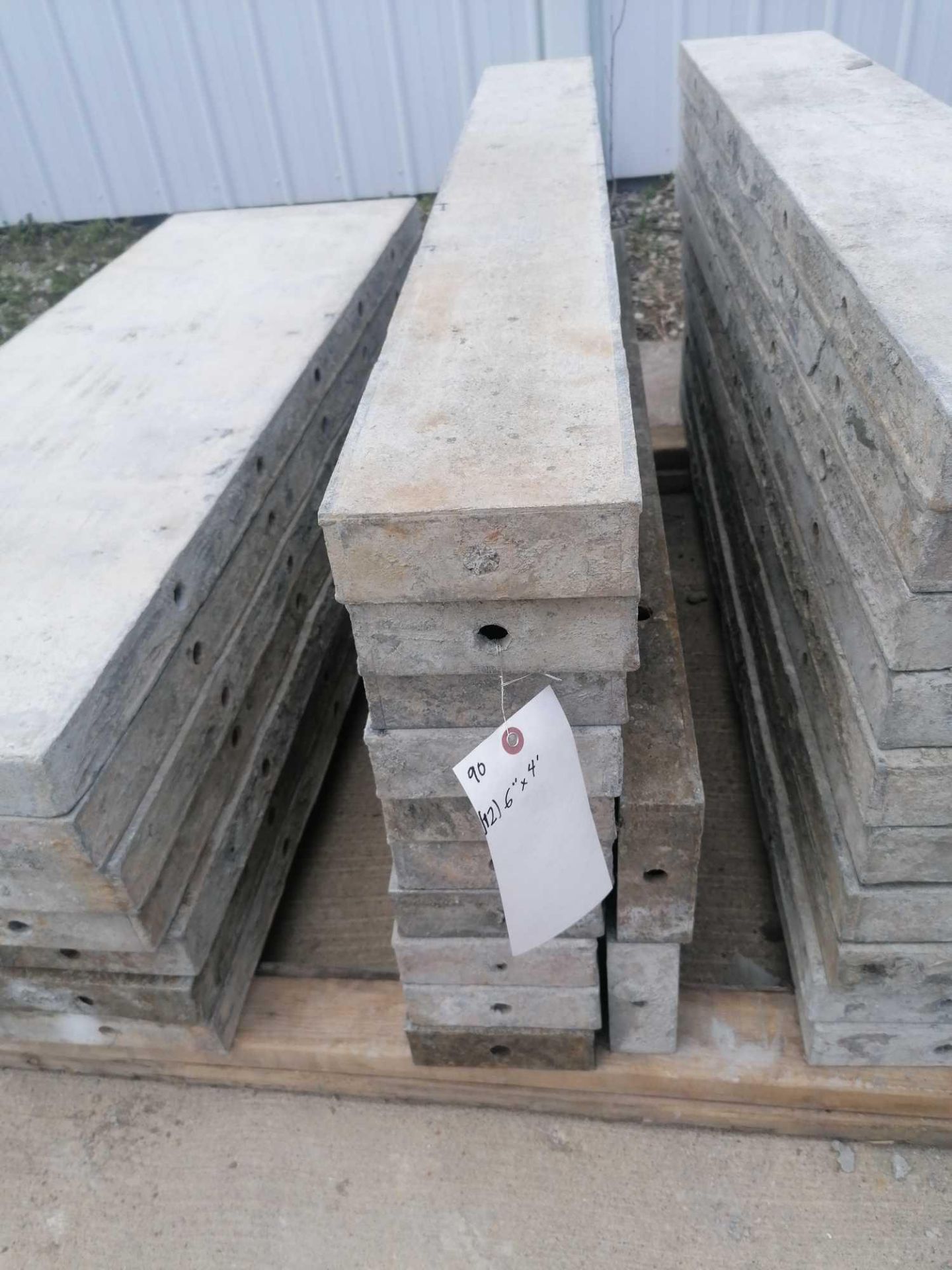 (12) 6" x 4' Durand Aluminum Concrete Forms, Smooth 8" Hole Pattern. Located at 301 E Henry