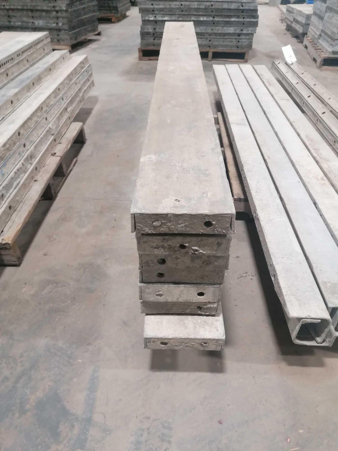 (7) 8" x 8' Jumps Western Aluminum Concrete Forms, Smooth 6-12 Hole Pattern. Located at 119 Spruce