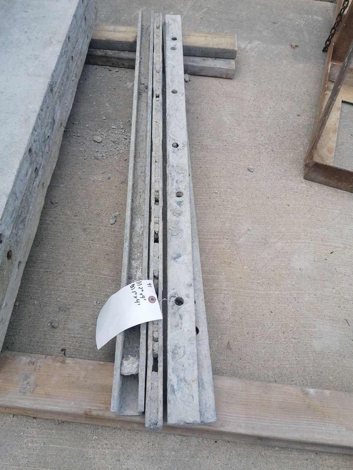 (1) 2" x 4' & (3) 1" x 4' Durand Aluminum Concrete Forms, Smooth 8" Hole Pattern. Located at 301 E