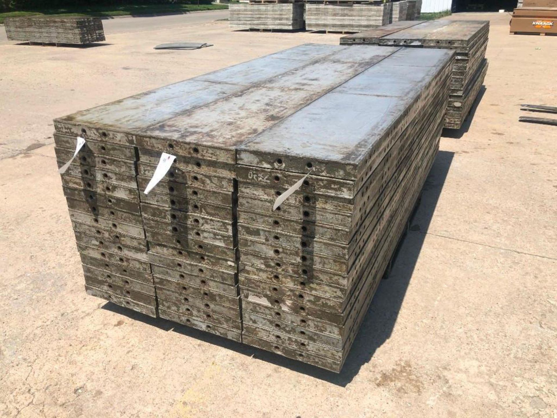 (15) 16" x 9' Wall-Ties Aluminum Concrete Forms, CAP, Smooth 6-12 Hole Pattern. Located at 301 E