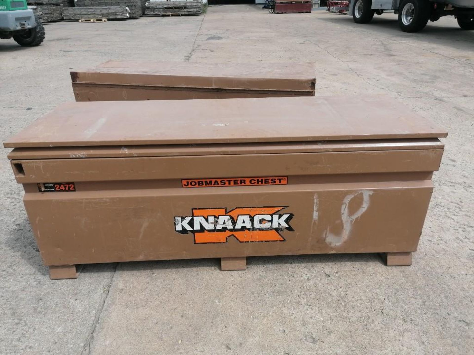 KNAACK Job Box Model 2472 with (57) Scaffolding brackets. Located at 301 E Henry Street, Mt.