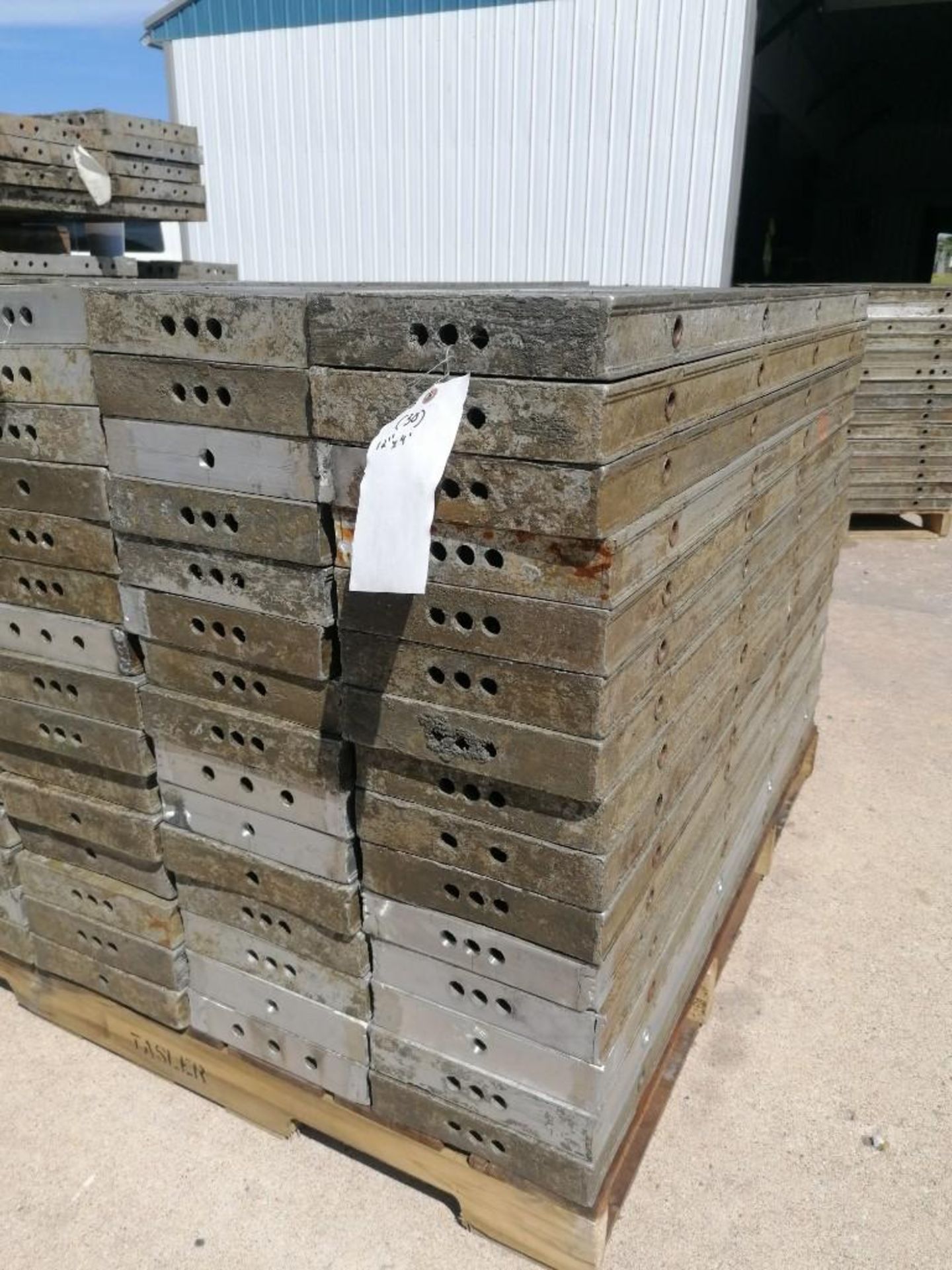 (30) 12" x 4' Wall-Ties Aluminum Concrete Forms, Smooth 6-12 Hole Pattern. Located at 301 E Henry