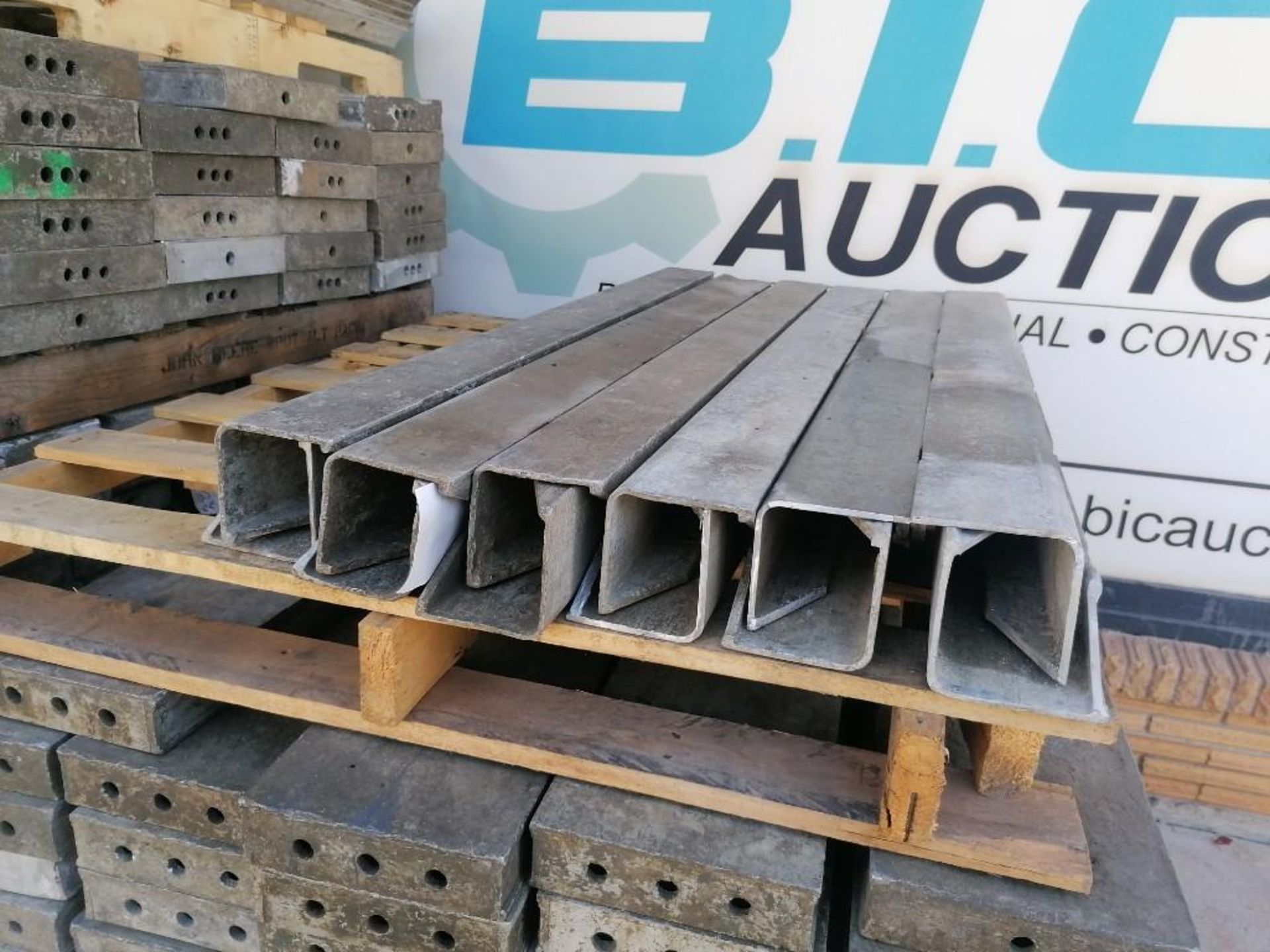 (12) 4" x 4" x 4' Full ISC Wall-Ties Aluminum Concrete Forms, Smooth 6-12 Hole Pattern. Located at
