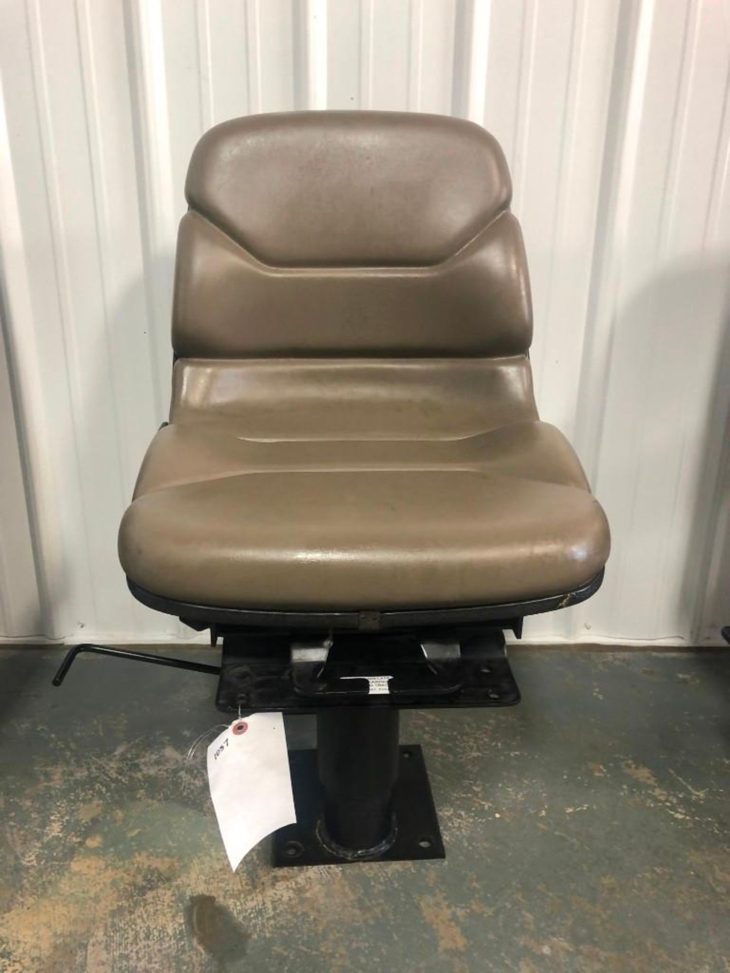 Backhoe Seat. Located at 301 E Henry Street, Mt. Pleasant, IA 52641.